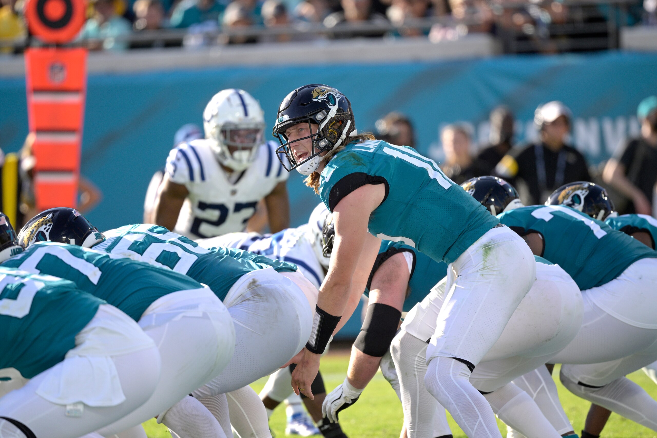 Jacksonville Jaguars quarterback Trevor Lawrence (16) calls out signals at the line of scrimmage during the second half of an NFL football game against the Indianapolis Colts, Sunday, Jan. 9, 2022, in Jacksonville, Fla. (AP Photo/Phelan M. Ebenhack)