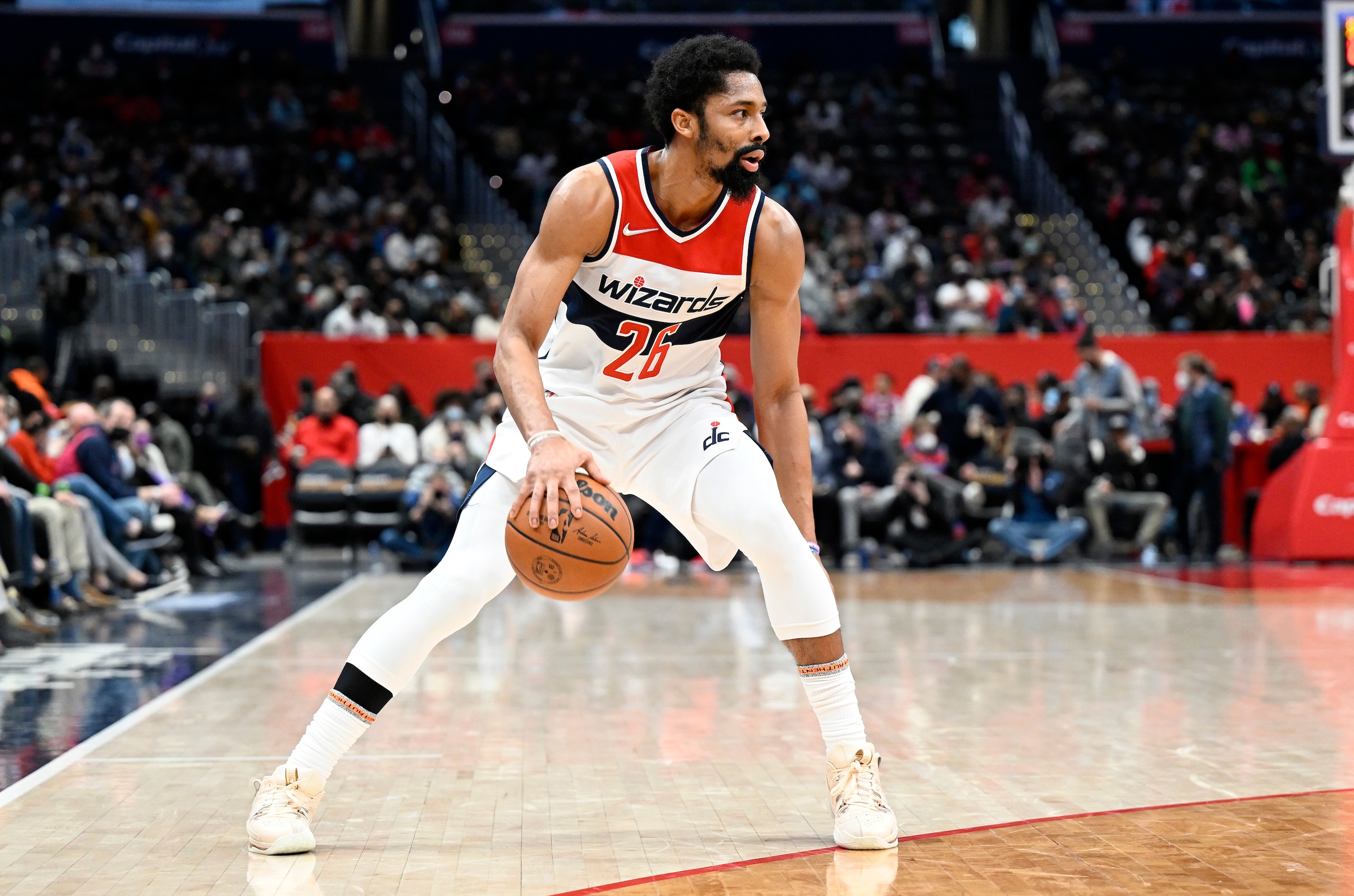 WASHINGTON, DC - FEBRUARY 07: Spencer Dinwiddie #26 of the Washington Wizards handles the ball against the Miami Heat at Capital One Arena on February 07, 2022 in Washington, DC. NOTE TO USER: User expressly acknowledges and agrees that, by downloading and or using this photograph, User is consenting to the terms and conditions of the Getty Images License Agreement.  (Photo by G Fiume/Getty Images)