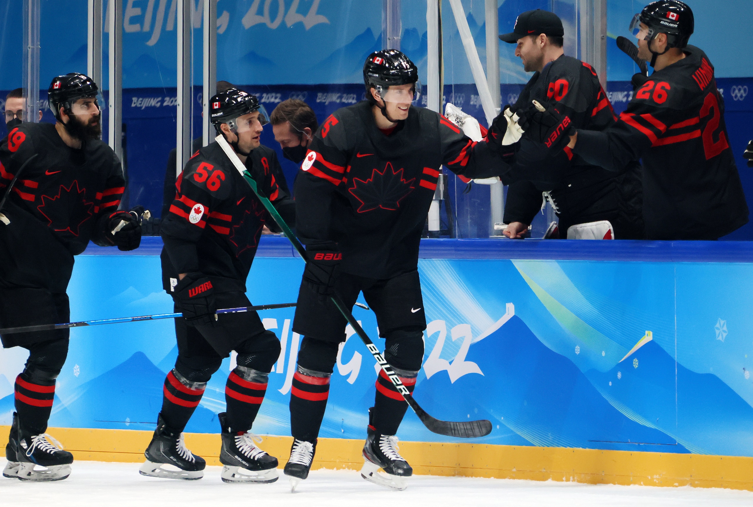 BEIJING, CHINA - FEBRUARY 15: Adam Tambellini #15 of Team Canada celebrates a goal with their team in the second period during the Men’s Ice Hockey Qualification Playoff match between Team China and Team Canada on Day 11 of the Beijing 2022 Winter Olympic Games at National Indoor Stadium on February 15, 2022 in Beijing, China. (Photo by Bruce Bennett/Getty Images)