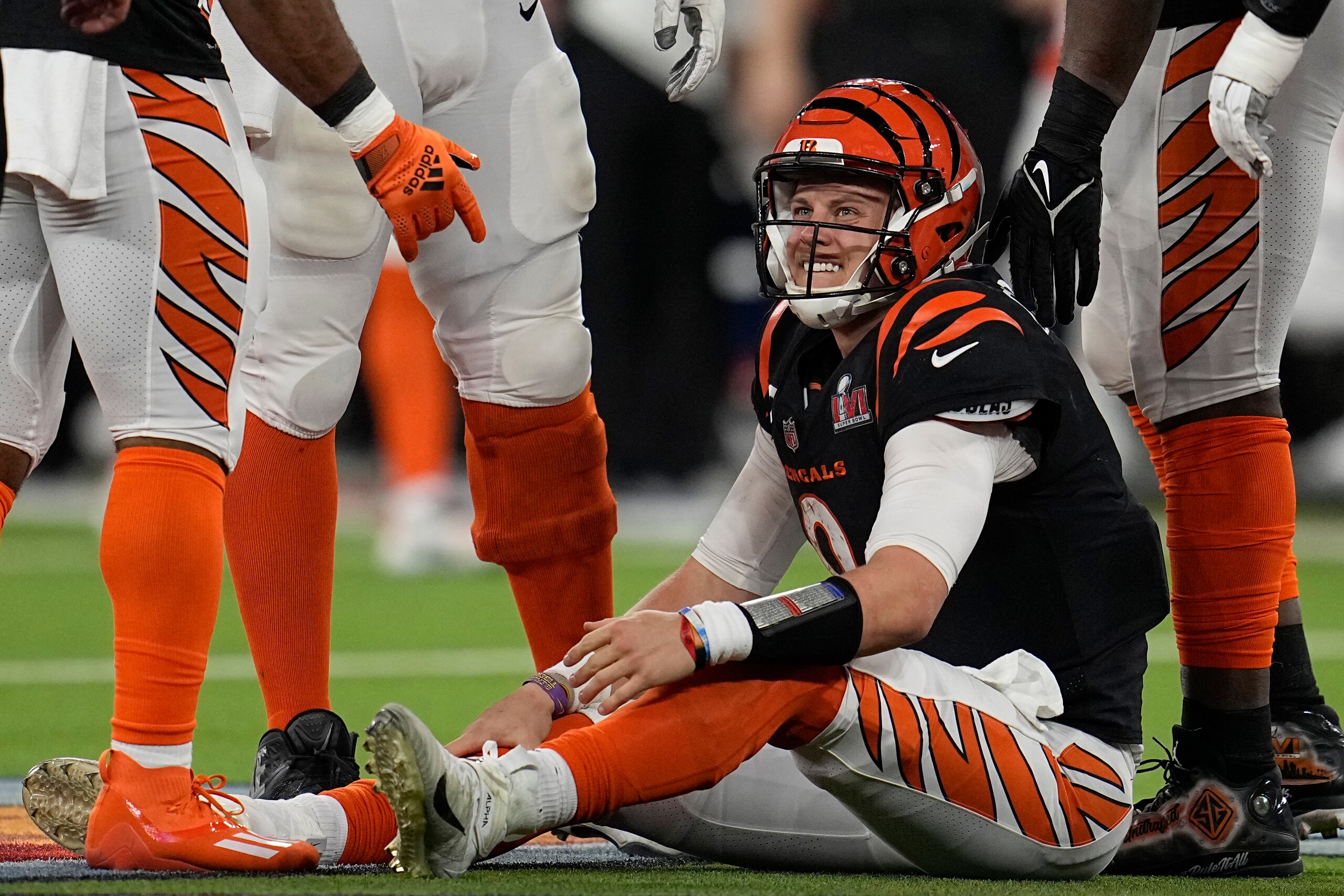 Cincinnati Bengals quarterback Joe Burrow reacts after being sacked by Los Angeles Rams outside linebacker Von Miller during the second half of the NFL Super Bowl 56 football game Sunday, Feb. 13, 2022, in Inglewood, Calif. (AP Photo/Marcio Jose Sanchez)