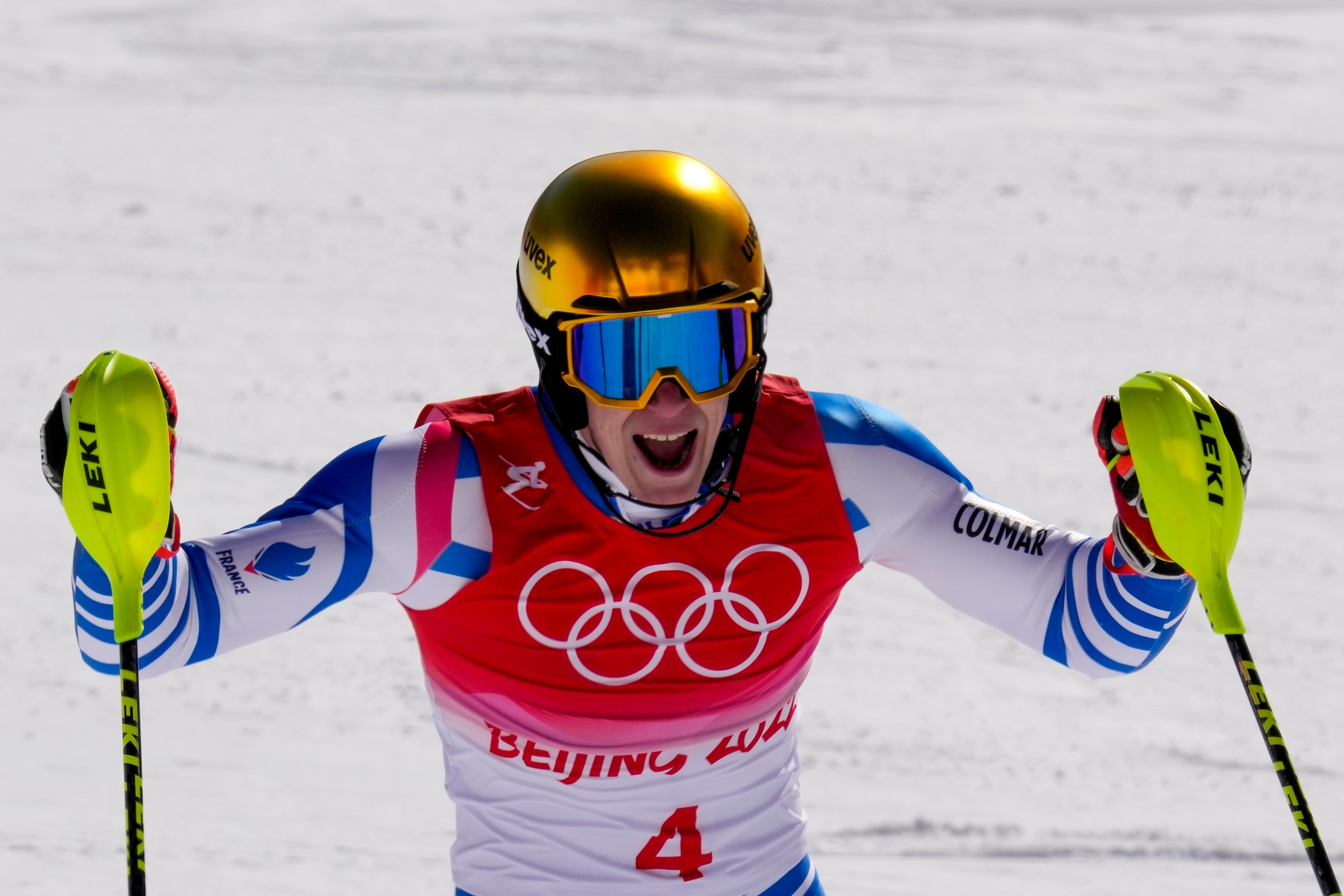Clemen'st Noel, of France, celebrates after finishing the men's slalom run 2 at the 2022 Winter Olympics, Wednesday, Feb. 16, 2022, in the Yanqing district of Beijing. (AP Photo/Luca Bruno)