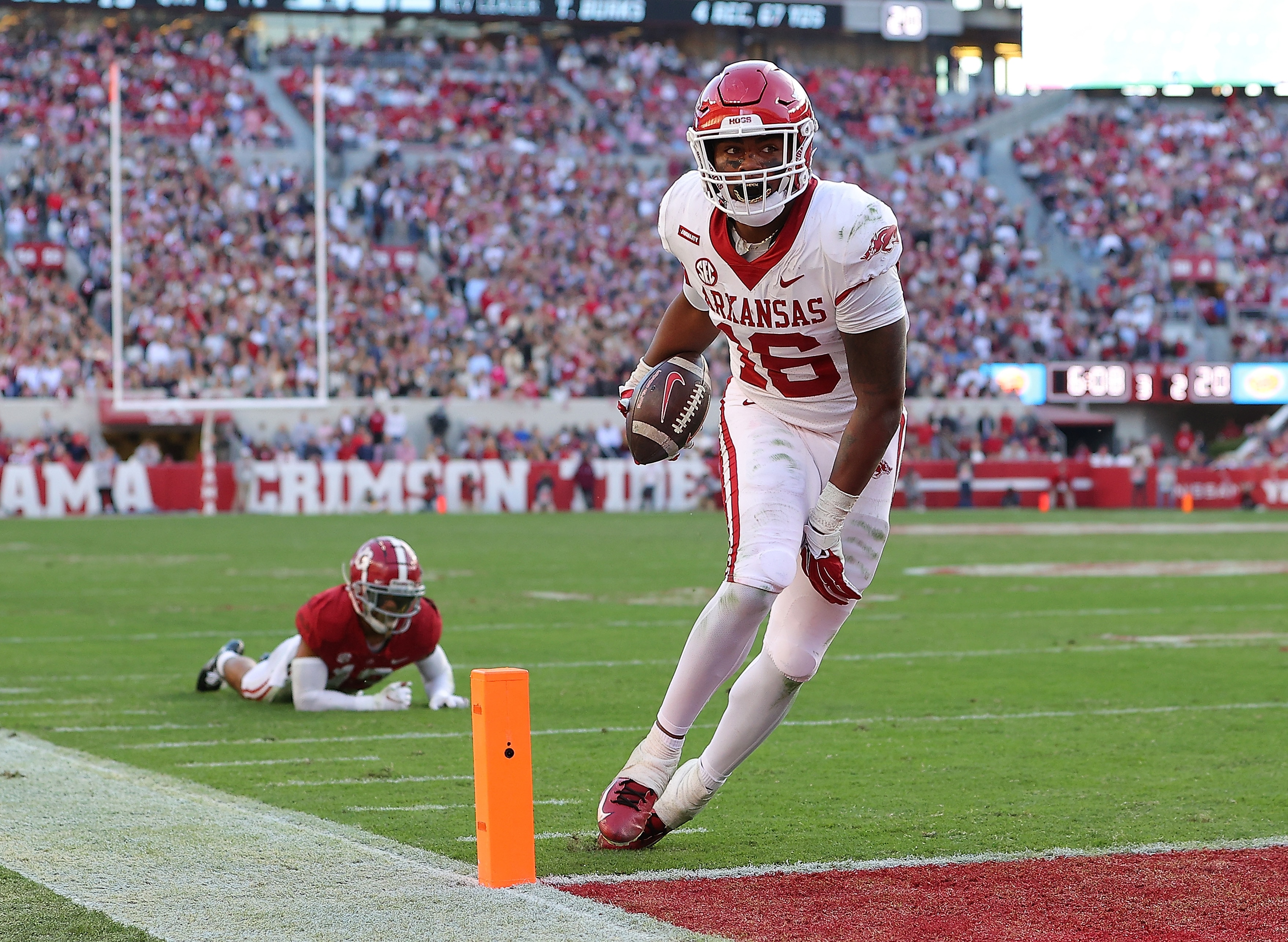 TUSCALOOSA, ALABAMA - NOVEMBER 20: Treylon Burks #16 of the Arkansas Razorbacks scores a touchdown against the Alabama Crimson Tide during the first half at Bryant-Denny Stadium on November 20, 2021 in Tuscaloosa, Alabama. (Photo by Kevin C. Cox/Getty Images) TUSCALOOSA, ALABAMA - NOVEMBER 20: Treylon Burks #16 of the Arkansas Razorbacks scores a touchdown against the Alabama Crimson Tide during the first half at Bryant-Denny Stadium on November 20, 2021 in Tuscaloosa, Alabama. (Photo by Kevin C. Cox/Getty Images)