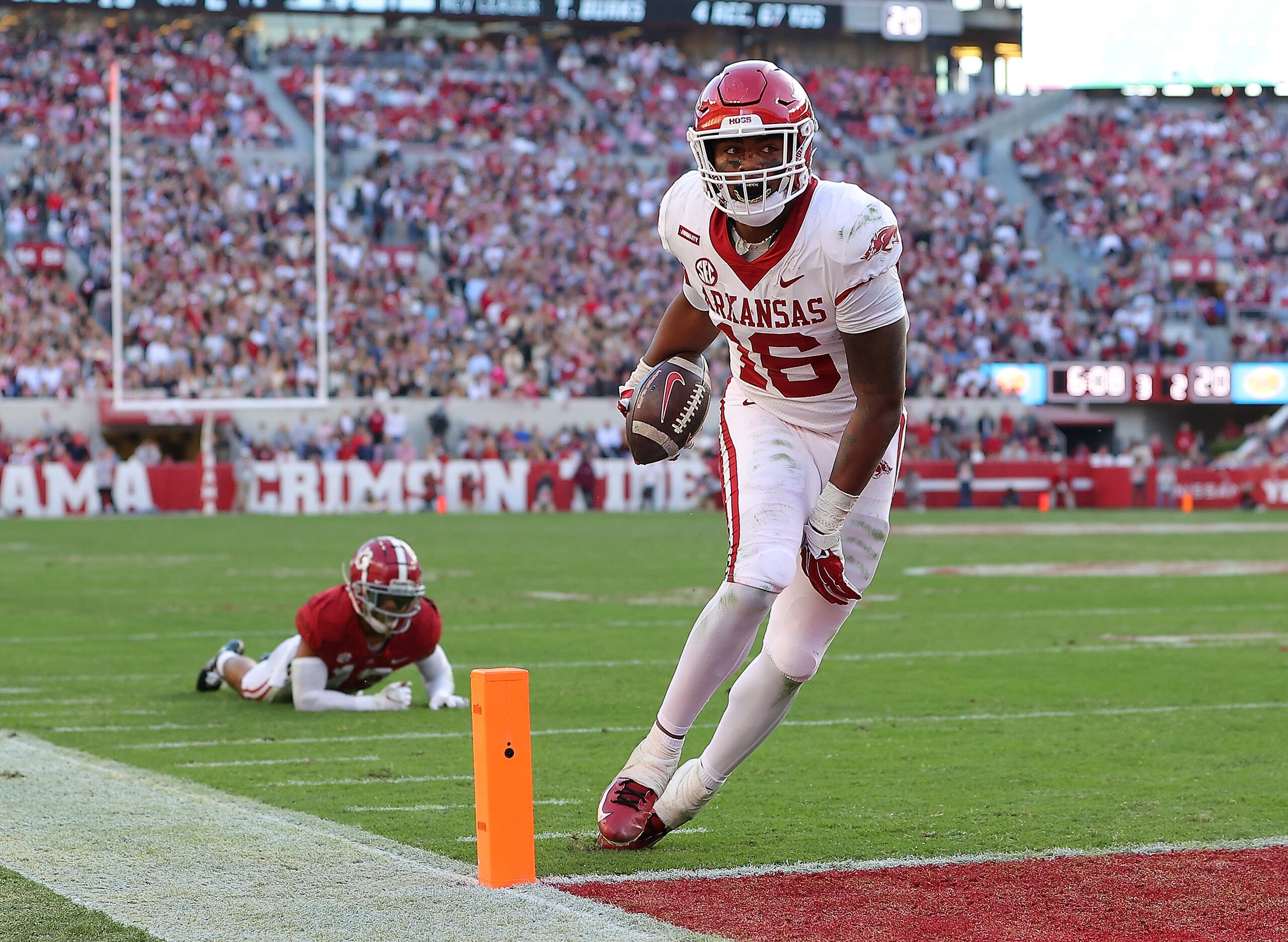 TUSCALOOSA, ALABAMA - NOVEMBER 20: Treylon Burks #16 of the Arkansas Razorbacks scores a touchdown against the Alabama Crimson Tide during the first half at Bryant-Denny Stadium on November 20, 2021 in Tuscaloosa, Alabama. (Photo by Kevin C. Cox/Getty Images) TUSCALOOSA, ALABAMA - NOVEMBER 20: Treylon Burks #16 of the Arkansas Razorbacks scores a touchdown against the Alabama Crimson Tide during the first half at Bryant-Denny Stadium on November 20, 2021 in Tuscaloosa, Alabama. (Photo by Kevin C. Cox/Getty Images)
