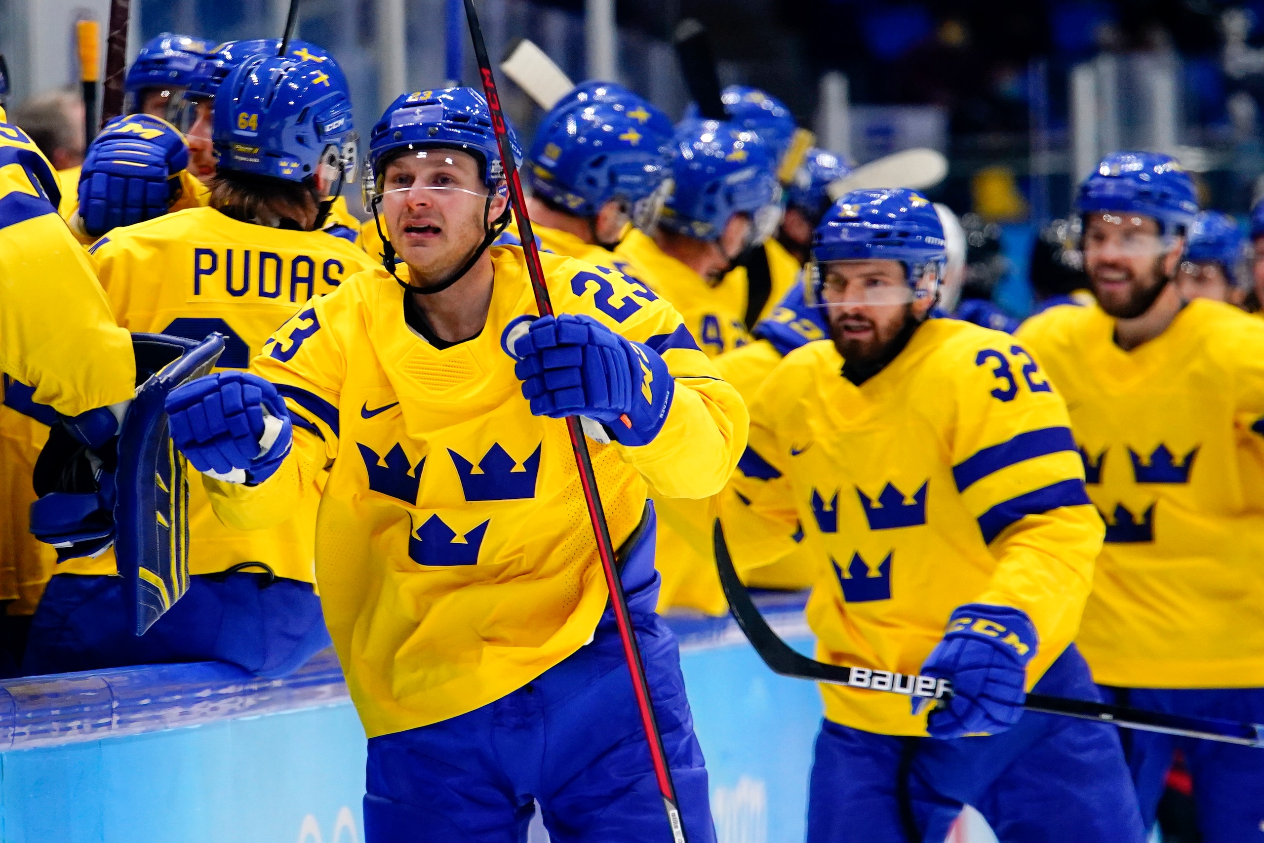 Sweden's Lucas Wallmark (23) celebrates after scoring a goal against Canada during a men's quarterfinal hockey game at the 2022 Winter Olympics, Wednesday, Feb. 16, 2022, in Beijing. (AP Photo/Matt Slocum)