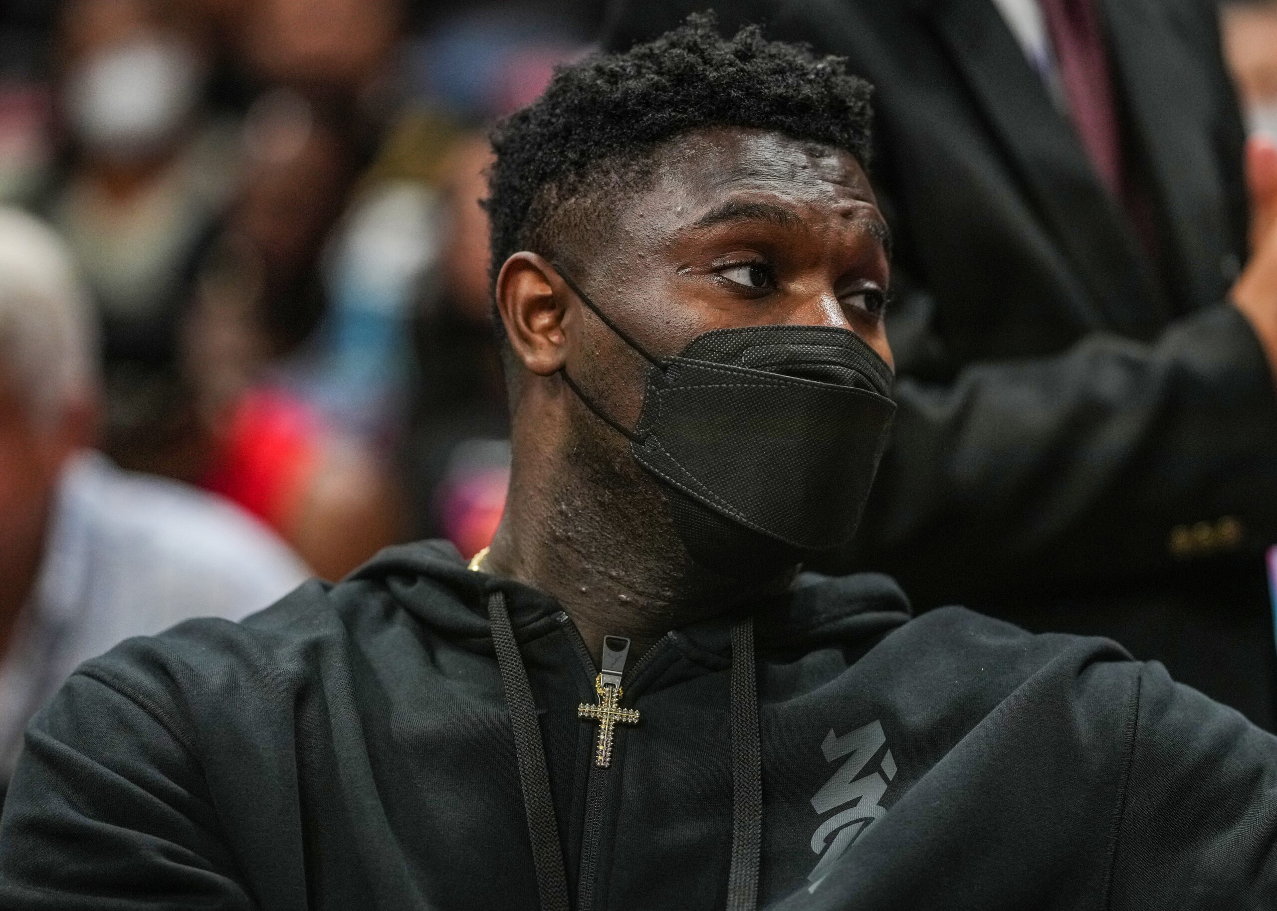MIAMI, FLORIDA - NOVEMBER 17: Zion Williamson #1 of the New Orleans Pelicans looks on from the bench during a timeout against the Miami Heat during the second half at FTX Arena on November 17, 2021 in Miami, Florida. NOTE TO USER: User expressly acknowledges and agrees that, by downloading and or using this photograph, User is consenting to the terms and conditions of the Getty Images License Agreement. (Photo by Mark Brown/Getty Images)