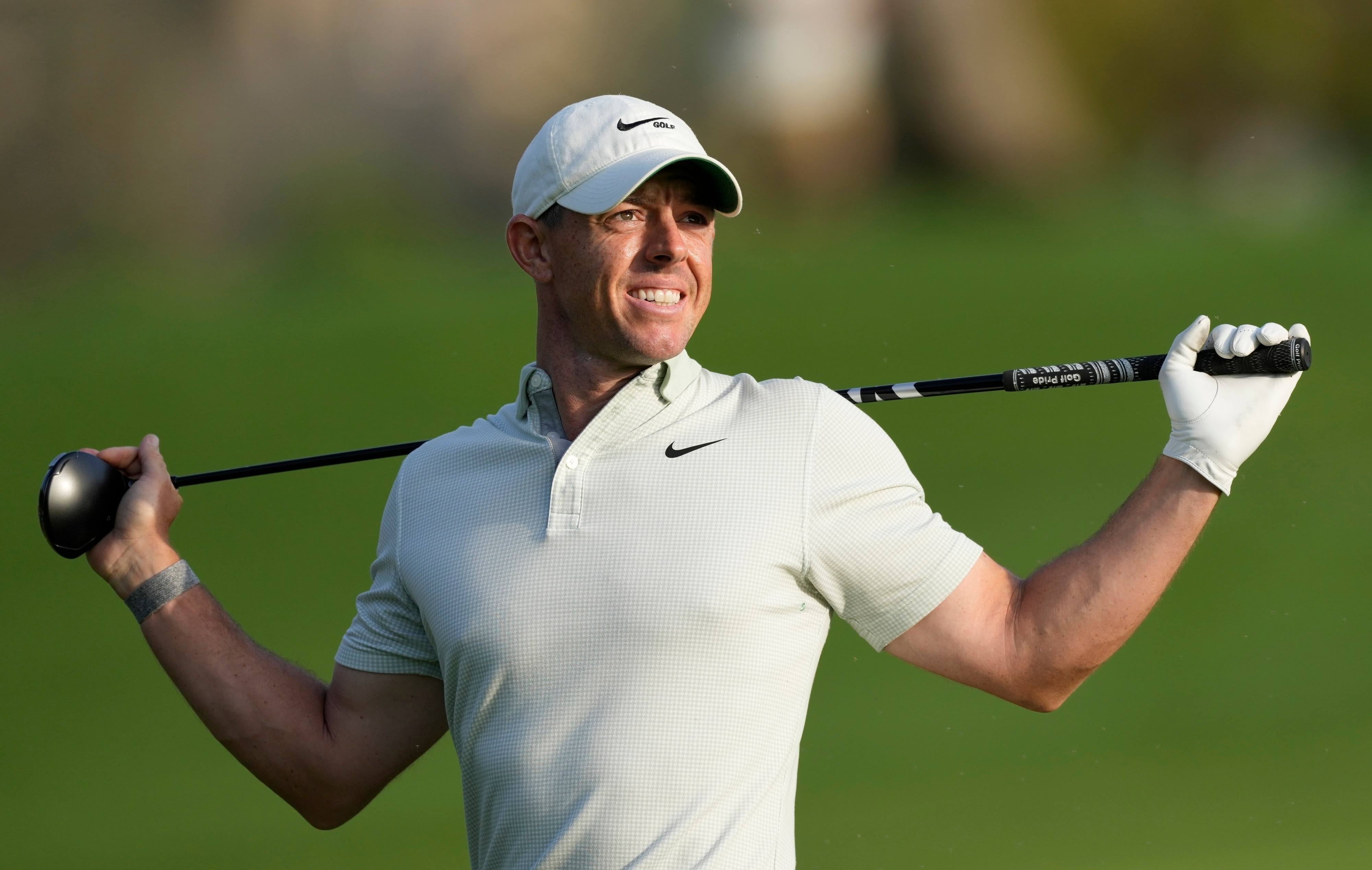 Rory McIlroy of Northern Ireland reacts after he dropped his ball in the water on the 18th fairway during final round of the Dubai Desert Classic golf tournament in Dubai, United Arab Emirates, Sunday, Jan. 30, 2022. (AP Photo/Kamran Jebreili)