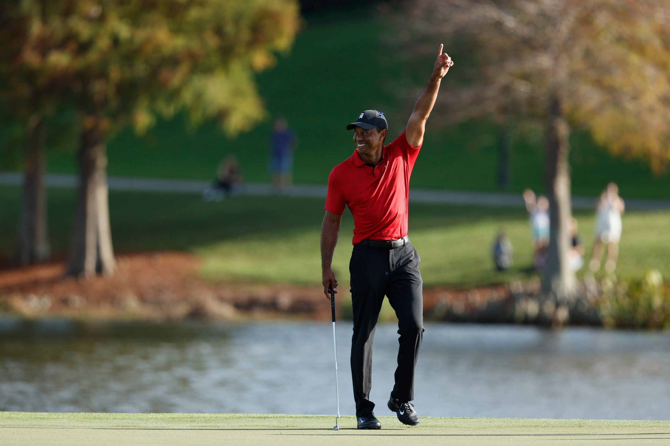 Tiger Woods reacts on the 17th green during the second round of the PNC Championship golf tournament Sunday, Dec. 19, 2021, in Orlando, Fla. (AP Photo/Scott Audette) Tiger Woods reacts on the 17th green during the second round of the PNC Championship golf tournament Sunday, Dec. 19, 2021, in Orlando, Fla. (AP Photo/Scott Audette)