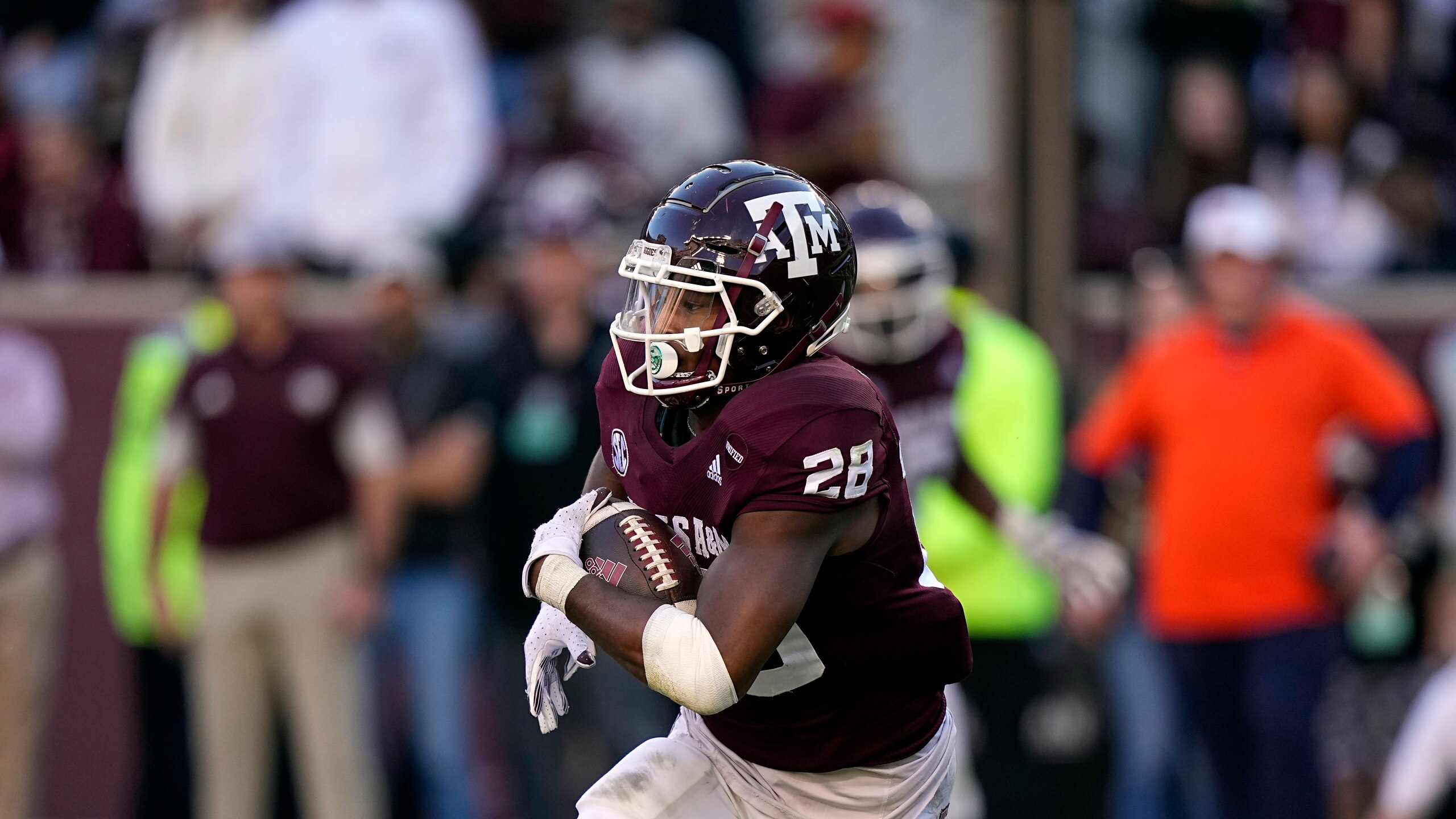 Texas A&M running back Isaiah Spiller (28) rushes for a gain against Auburn during the second half of an NCAA college football game Saturday, Nov. 6, 2021, in College Station, Texas. (AP Photo/David J. Phillip)