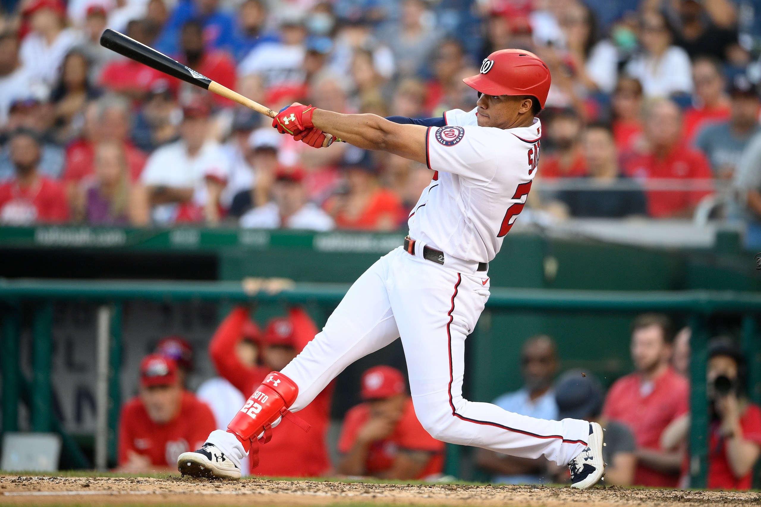 Washington Nationals' Juan Soto bats during a baseball game against the Boston Red Sox, Sunday, Oct. 3, 2021, in Washington. The Red Sox won 7-5. (AP Photo/Nick Wass)