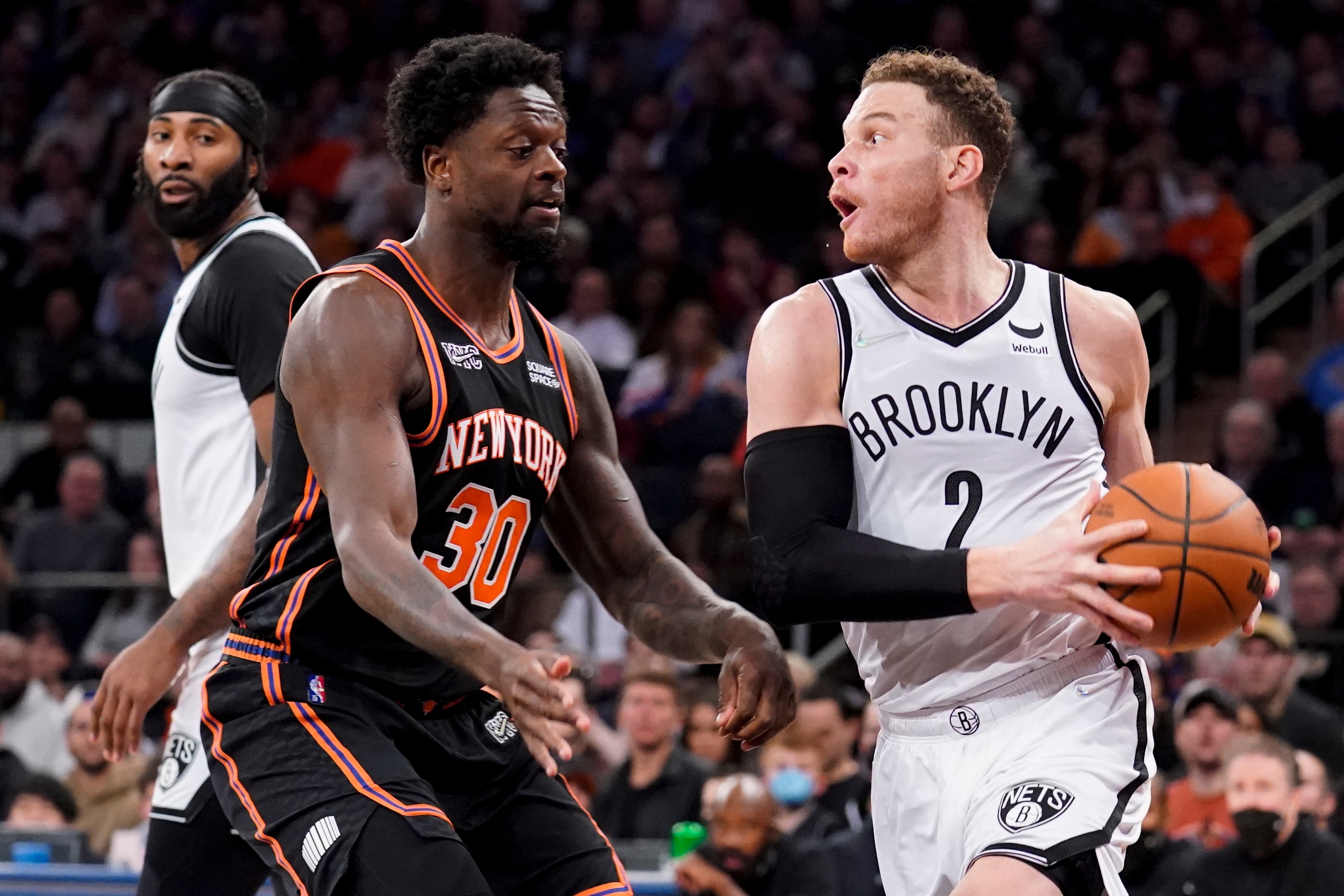 Brooklyn Nets forward Blake Griffin (2) drives against New York Knicks forward Julius Randle (30) during the first half of an NBA basketball game, Wednesday, Feb. 16, 2022, in New York. (AP Photo/John Minchillo)