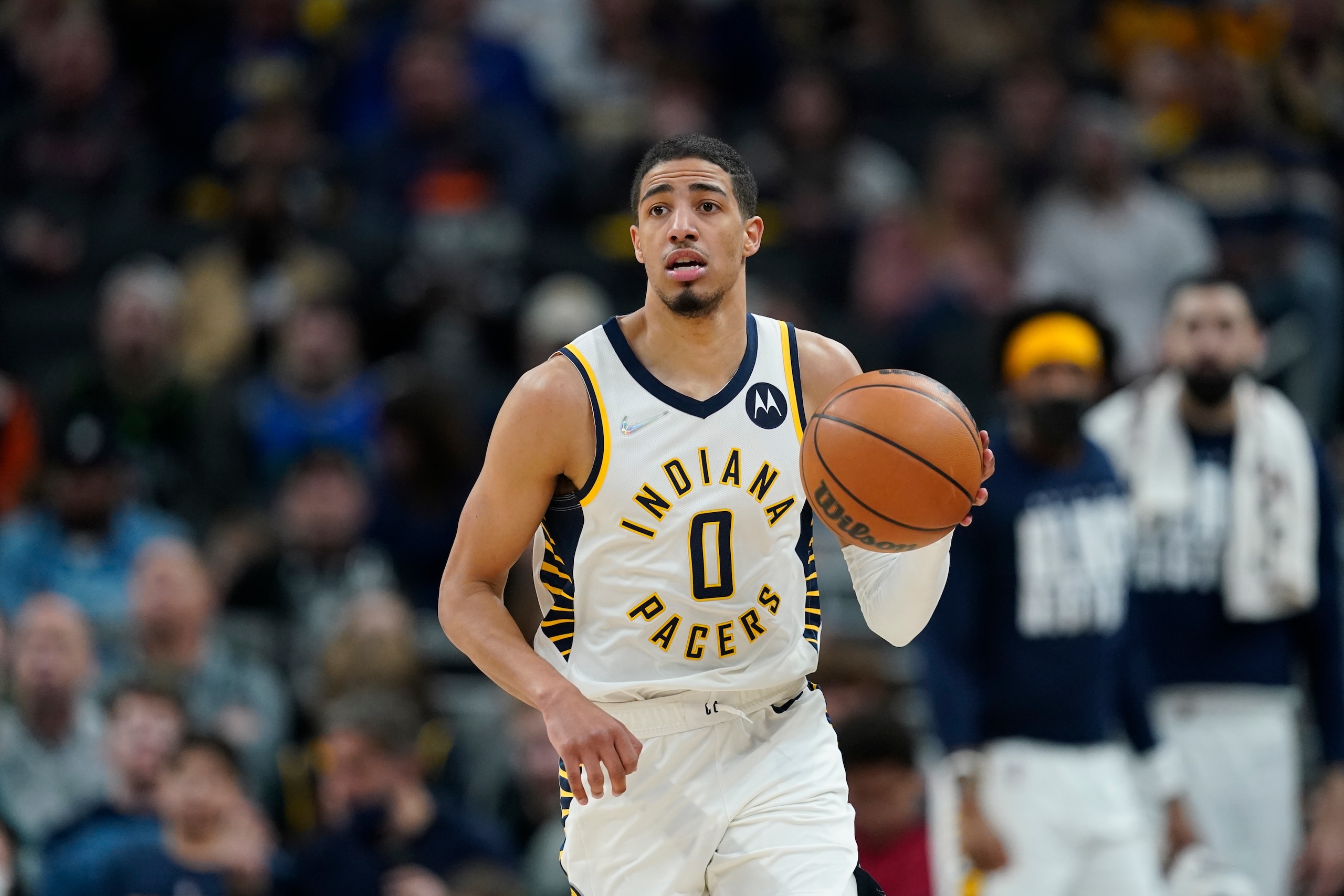 Indiana Pacers' Tyrese Haliburton (0) dribbles during the second half of an NBA basketball game against the Minnesota Timberwolves, Sunday, Feb. 13, 2022, in Indianapolis. Minnesota won 129-120. (AP Photo/Darron Cummings)