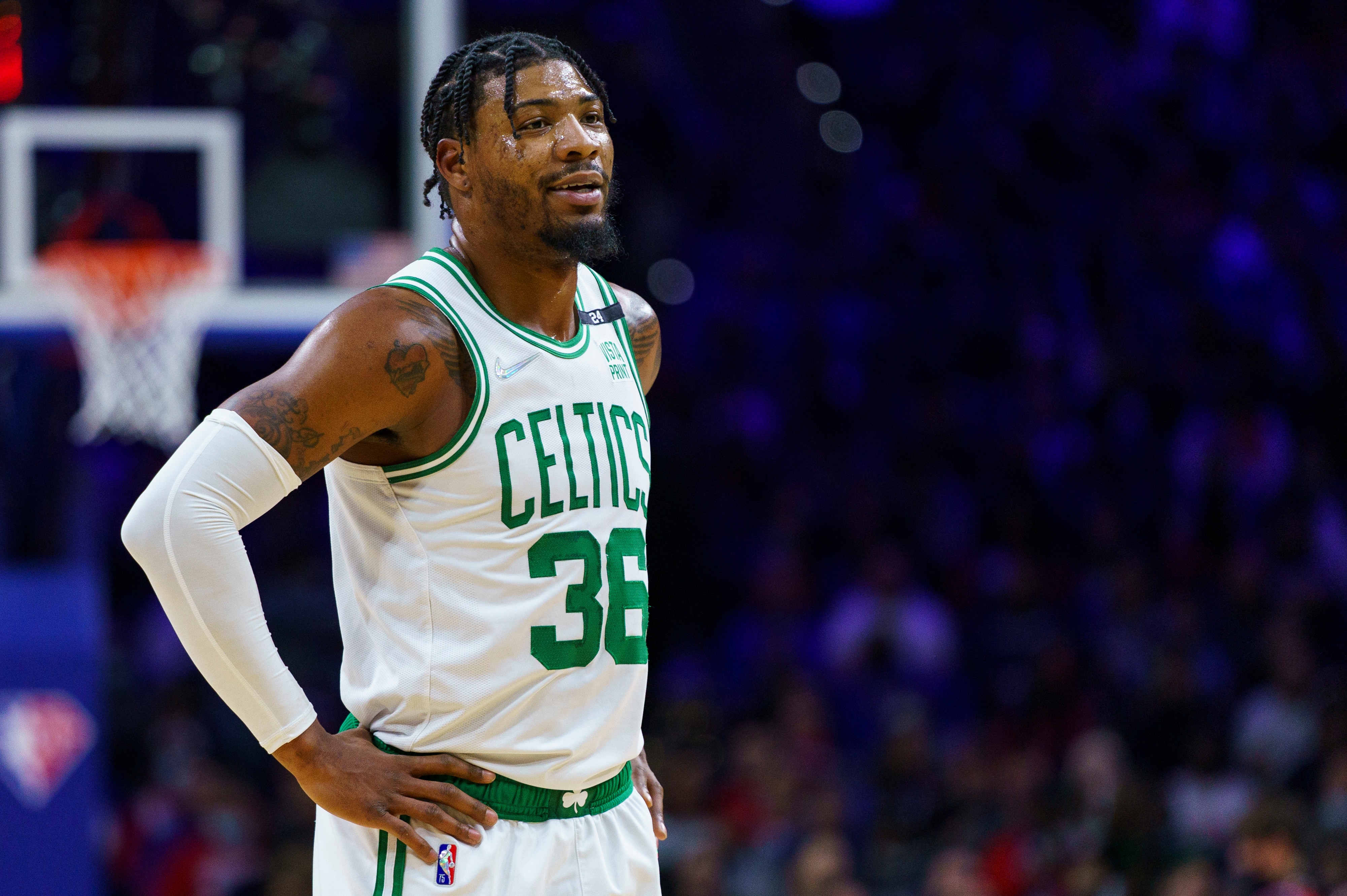 Boston Celtics' Marcus Smart looks on during the first half of an NBA basketball game against the Philadelphia 76ers, Tuesday, Feb. 15, 2022, in Philadelphia. The Celtics won 135-87. (AP Photo/Chris Szagola)