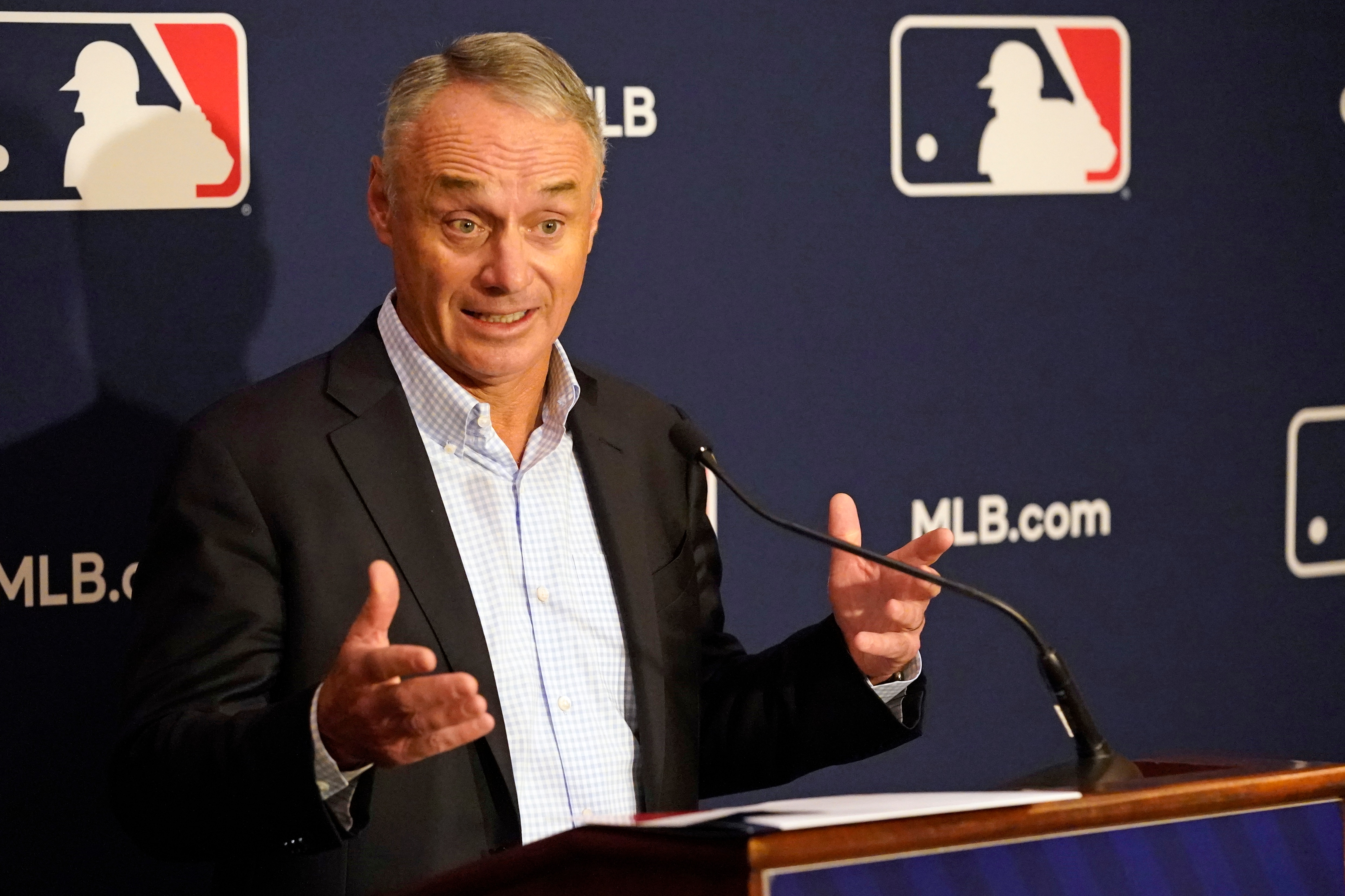 MLB commissioner Rob Manfred makes comments during a news conference at MLB baseball owners meetings, Thursday, Feb. 10, 2022, in Orlando, Fla. (AP Photo/John Raoux)