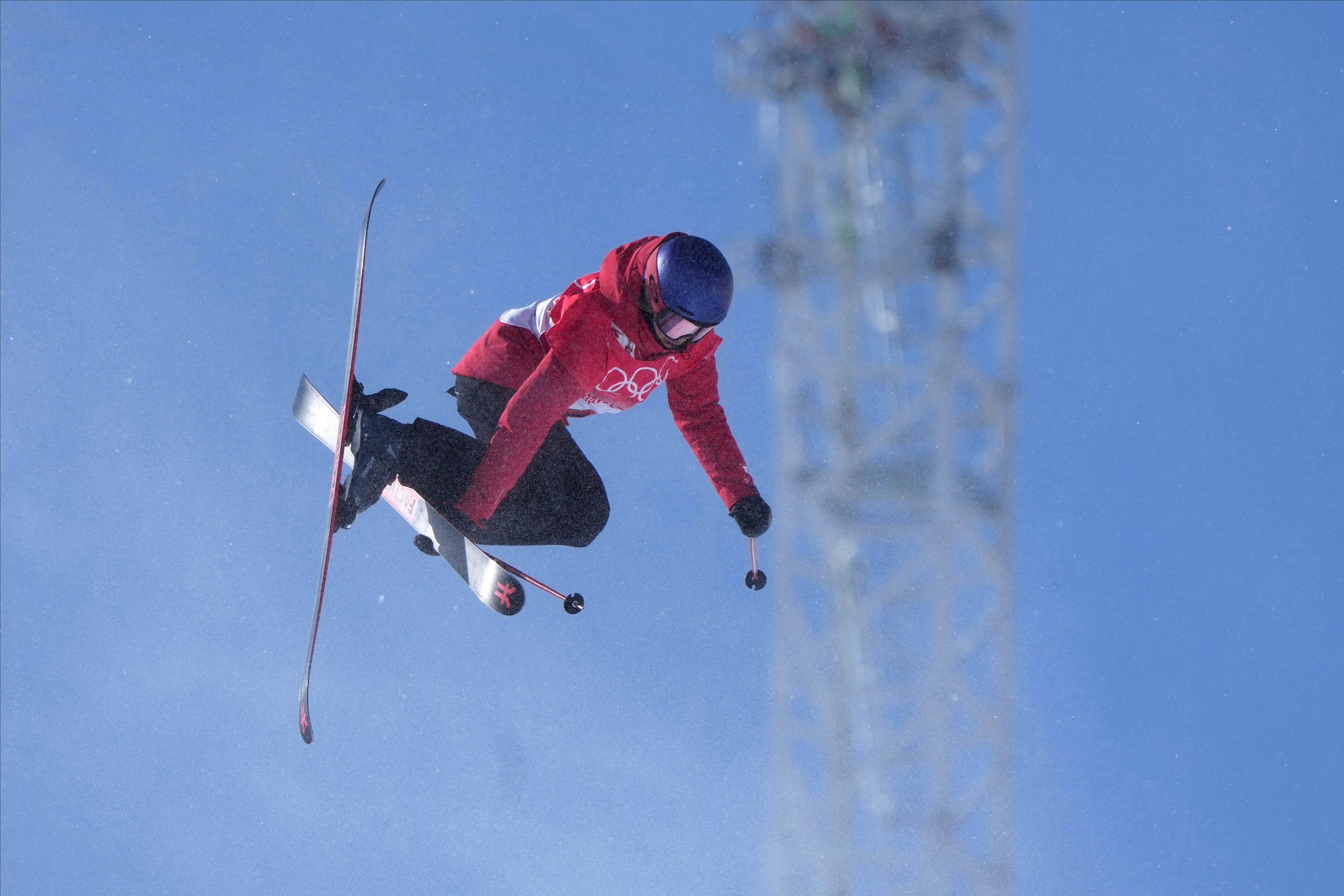 China's Eileen Gu competes during the women's halfpipe finals at the 2022 Winter Olympics, Friday, Feb. 18, 2022, in Zhangjiakou, China. (AP Photo/Lee Jin-man)