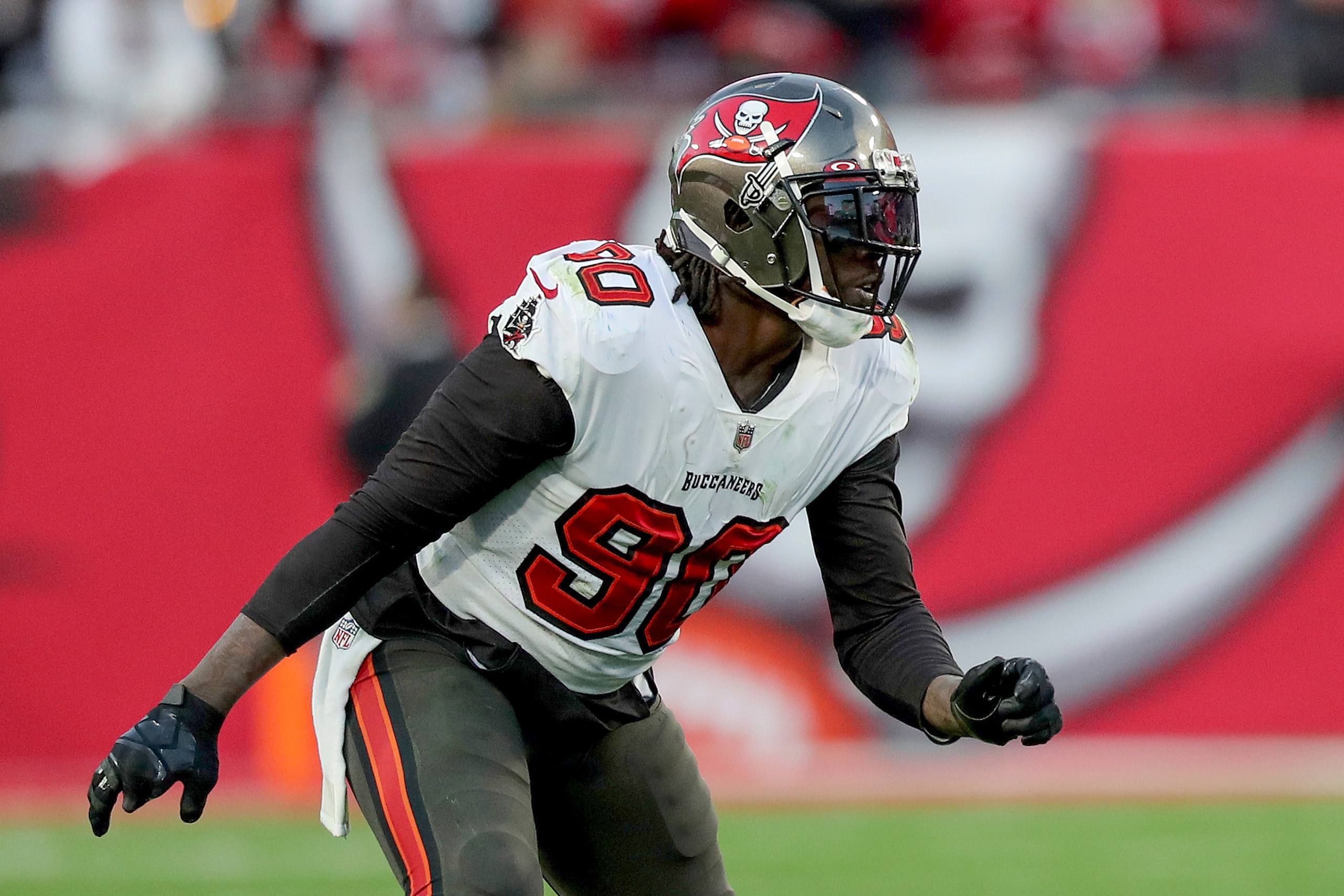 Tampa Bay Buccaneers outside linebacker Jason Pierre-Paul (90) follows the ball during a NFL divisional playoff football game between the Los Angeles Rams and Tampa Bay Buccaneers, Sunday, January 23, 2022 in Tampa, Fla. (AP Photo/Alex Menendez)