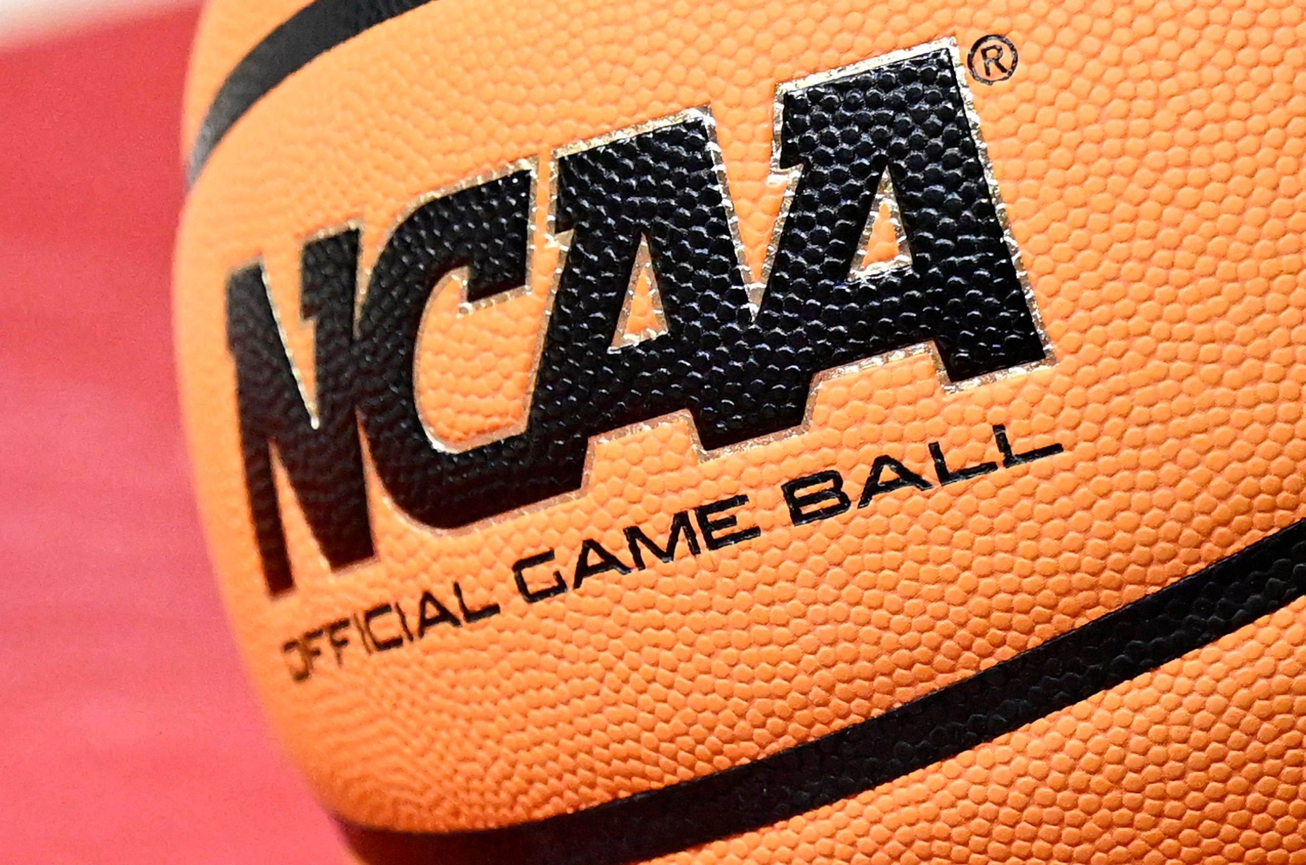 COLLEGE PARK, MARYLAND - FEBRUARY 09: The NCAA logo on the basketball during the game between the Maryland Terrapins and the Wisconsin Badgers at Xfinity Center on February 09, 2022 in College Park, Maryland. (Photo by G Fiume/Getty Images)