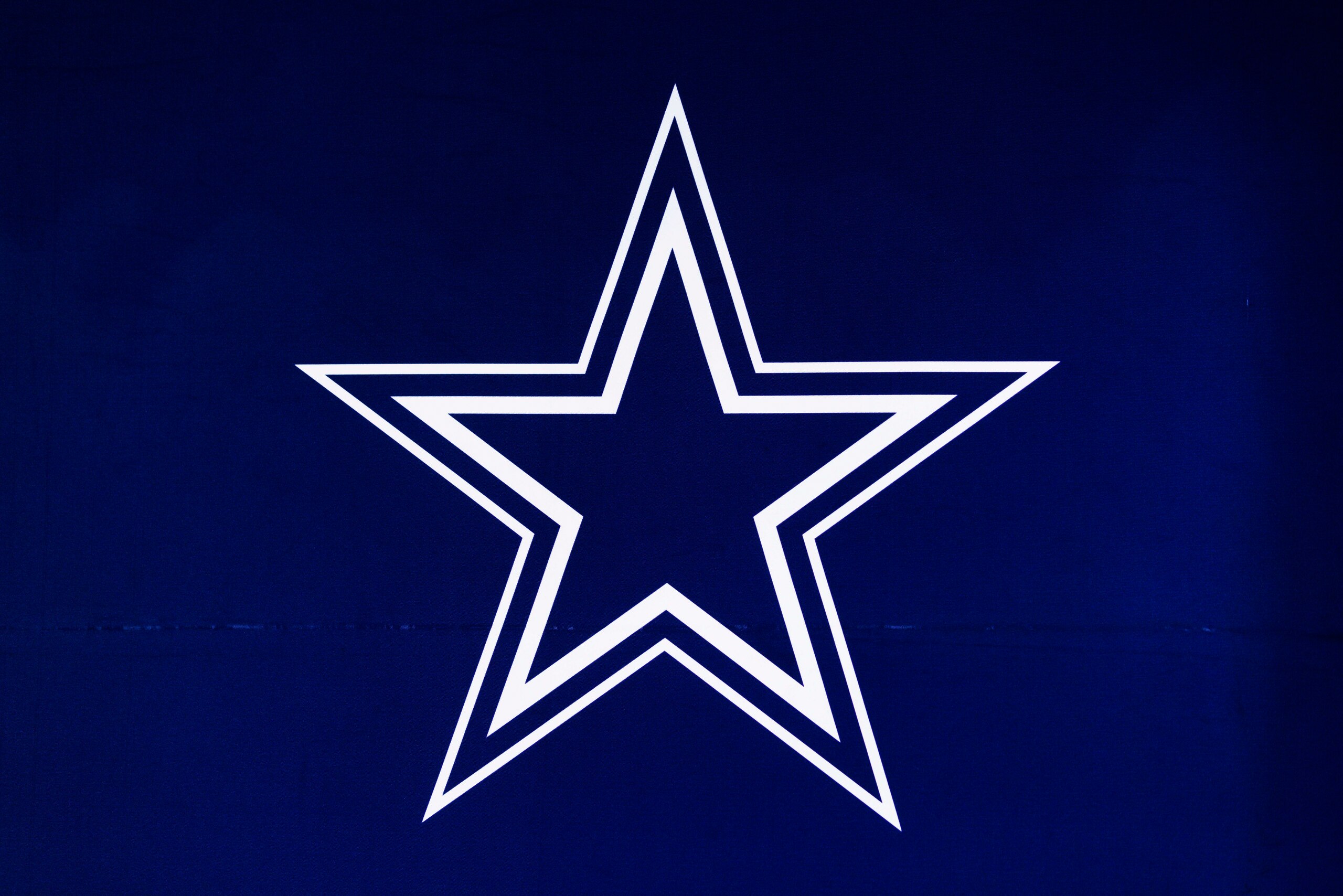 LOS ANGELES, CA - FEBRUARY 08: Detail view of the Dallas Cowboys logo seen at the Super Bowl Experience on February 08, 2022, at the Los Angeles Convention Center in Los Angeles, CA. (Photo by Ric Tapia/Icon Sportswire via Getty Images) LOS ANGELES, CA - FEBRUARY 08: Detail view of the Dallas Cowboys logo seen at the Super Bowl Experience on February 08, 2022, at the Los Angeles Convention Center in Los Angeles, CA. (Photo by Ric Tapia/Icon Sportswire via Getty Images)