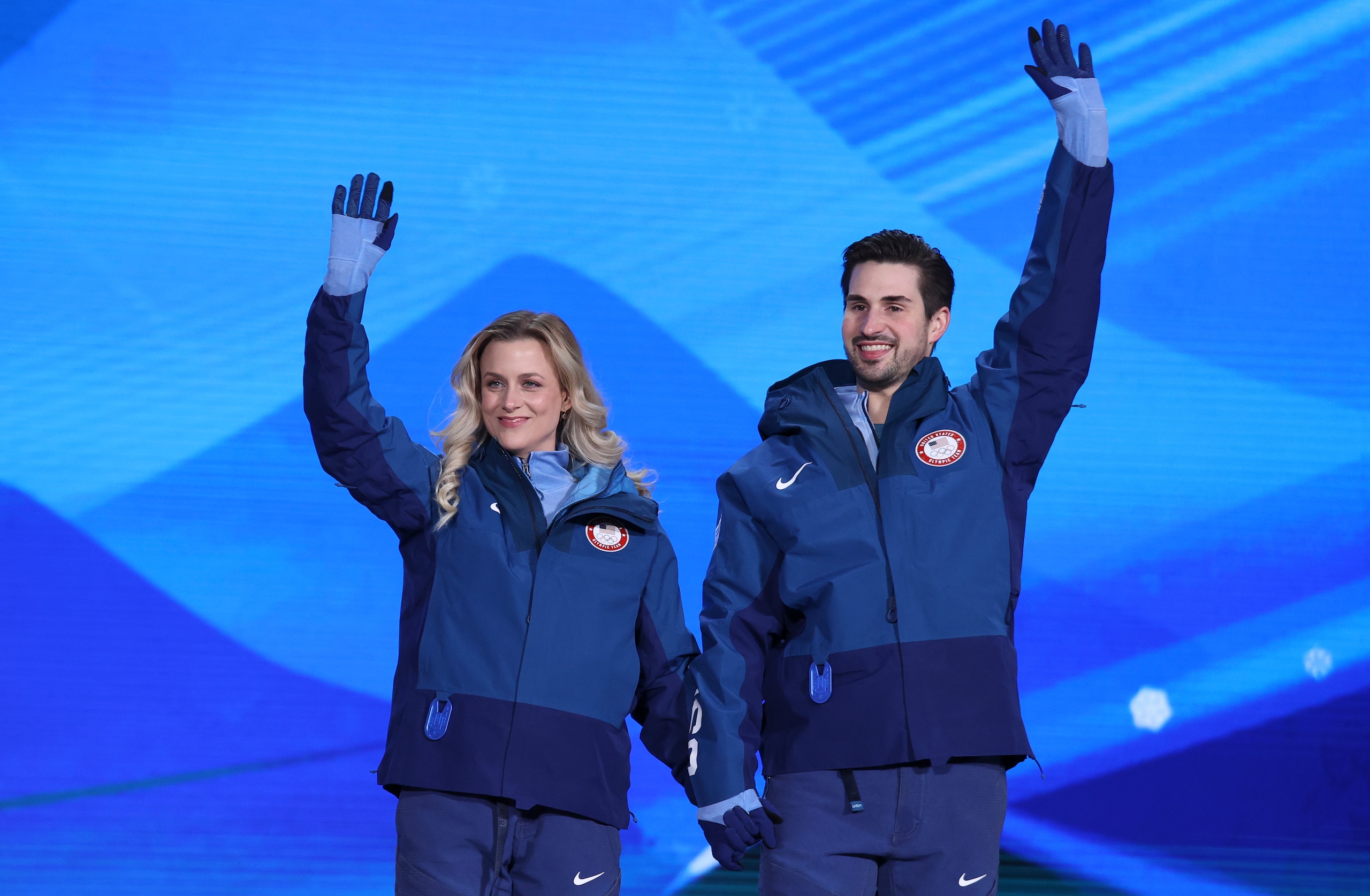 BEIJING, CHINA - FEBRUARY 14: Bronze medalists Madison Hubbell and Zachary Donohue of USA celebrate during the Figure Skating Ice Dance Free Dance medal ceremony on Day 10 of the Beijing 2022 Winter Olympics at Medal Plaza on February 14, 2022 in Beijing, China. (Photo by Jean Catuffe/Getty Images)