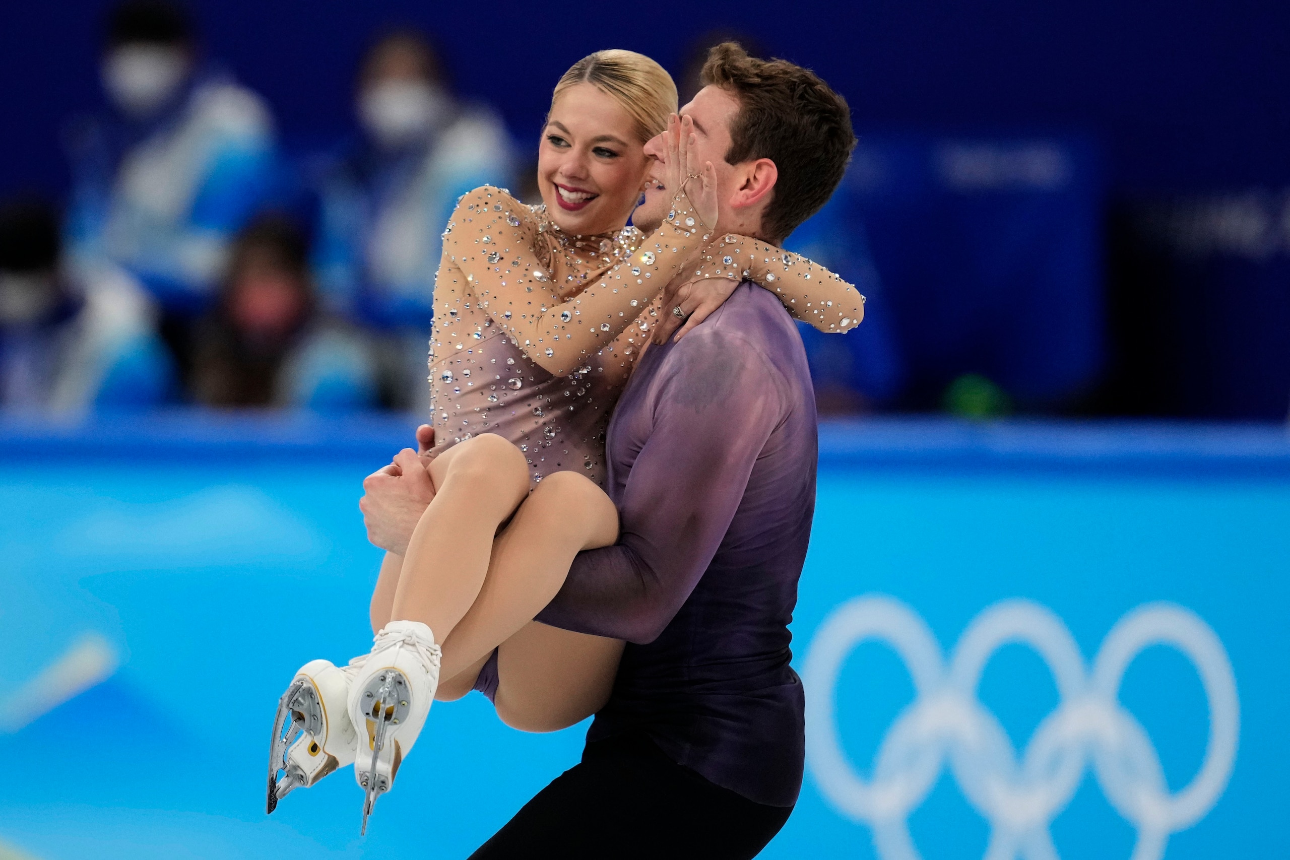Alexa Knierim and Brandon Frazier, of the United States, compete in the pairs free skate program during the figure skating competition at the 2022 Winter Olympics, Saturday, Feb. 19, 2022, in Beijing. (AP Photo/Natacha Pisarenko)