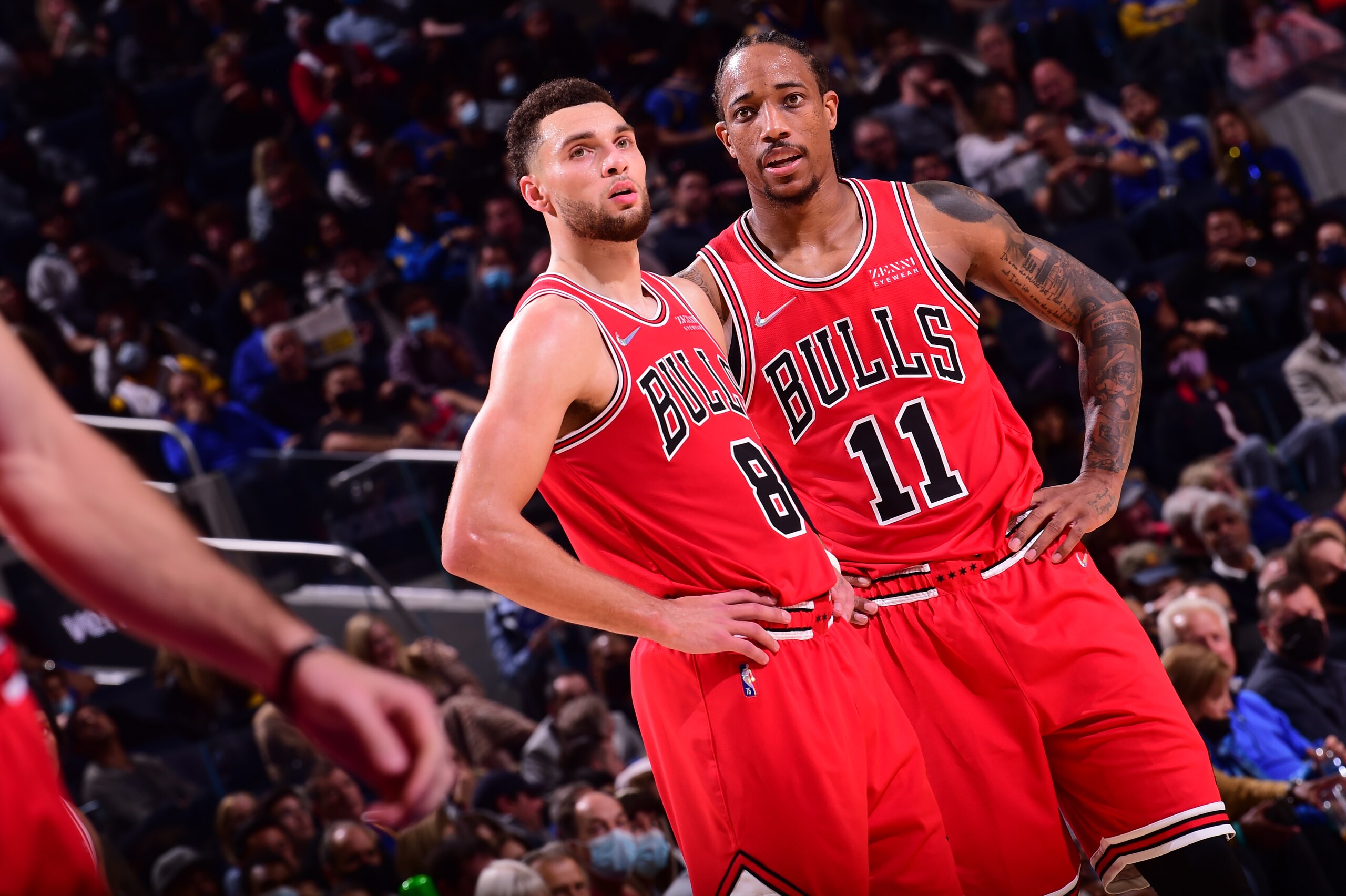 SAN FRANCISCO, CA - NOVEMBER 12: Zach LaVine #8 and DeMar DeRozan #11 of the Chicago Bulls looks on during the game against the Golden State Warriors on November 12, 2021 at Chase Center in San Francisco, California. NOTE TO USER: User expressly acknowledges and agrees that, by downloading and or using this photograph, user is consenting to the terms and conditions of Getty Images License Agreement. Mandatory Copyright Notice: Copyright 2021 NBAE (Photo by Noah Graham/NBAE via Getty Images)