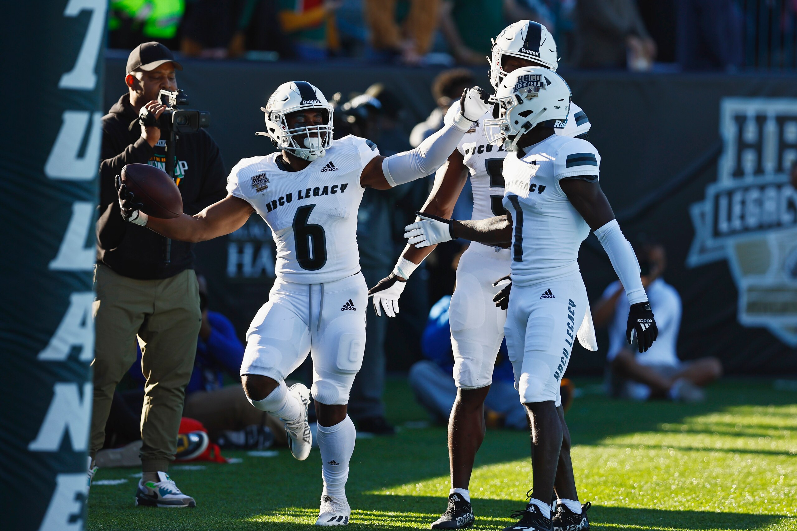 Bowie State running back Calil Wilkins (6) celebrates with teammates after scoring during the HBCU Legacy Bowl on Saturday, Feb. 19, 2022 in New Orleans. (Brandon Wade/AP Images for NFL)