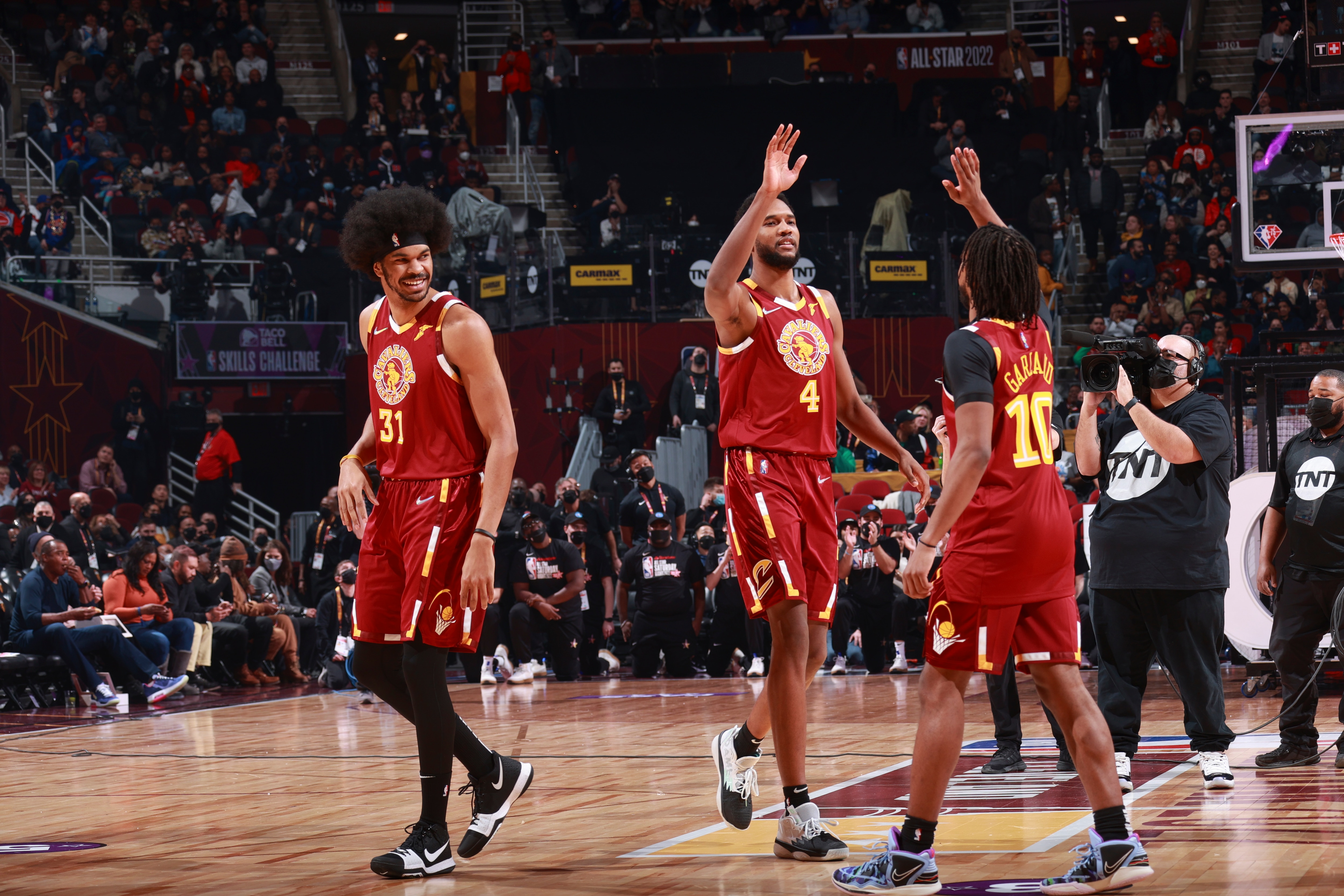 CLEVELAND, OH - FEBRUARY 19: Jarrett Allen #31 of the Cleveland Cavaliers smiles and Evan Mobley #4 of the Cleveland Cavaliers high fives Darius Garland #10 of the Cleveland Cavaliers during the Taco Bell Skills Challenge as part of 2022 NBA All Star Weekend on February 19, 2022 at Rocket Mortgage FieldHouse in Cleveland, Ohio. NOTE TO USER: User expressly acknowledges and agrees that, by downloading and/or using this Photograph, user is consenting to the terms and conditions of the Getty Images License Agreement. Mandatory Copyright Notice: Copyright 2022 NBAE (Photo by Nathaniel S. Butler/NBAE via Getty Images)