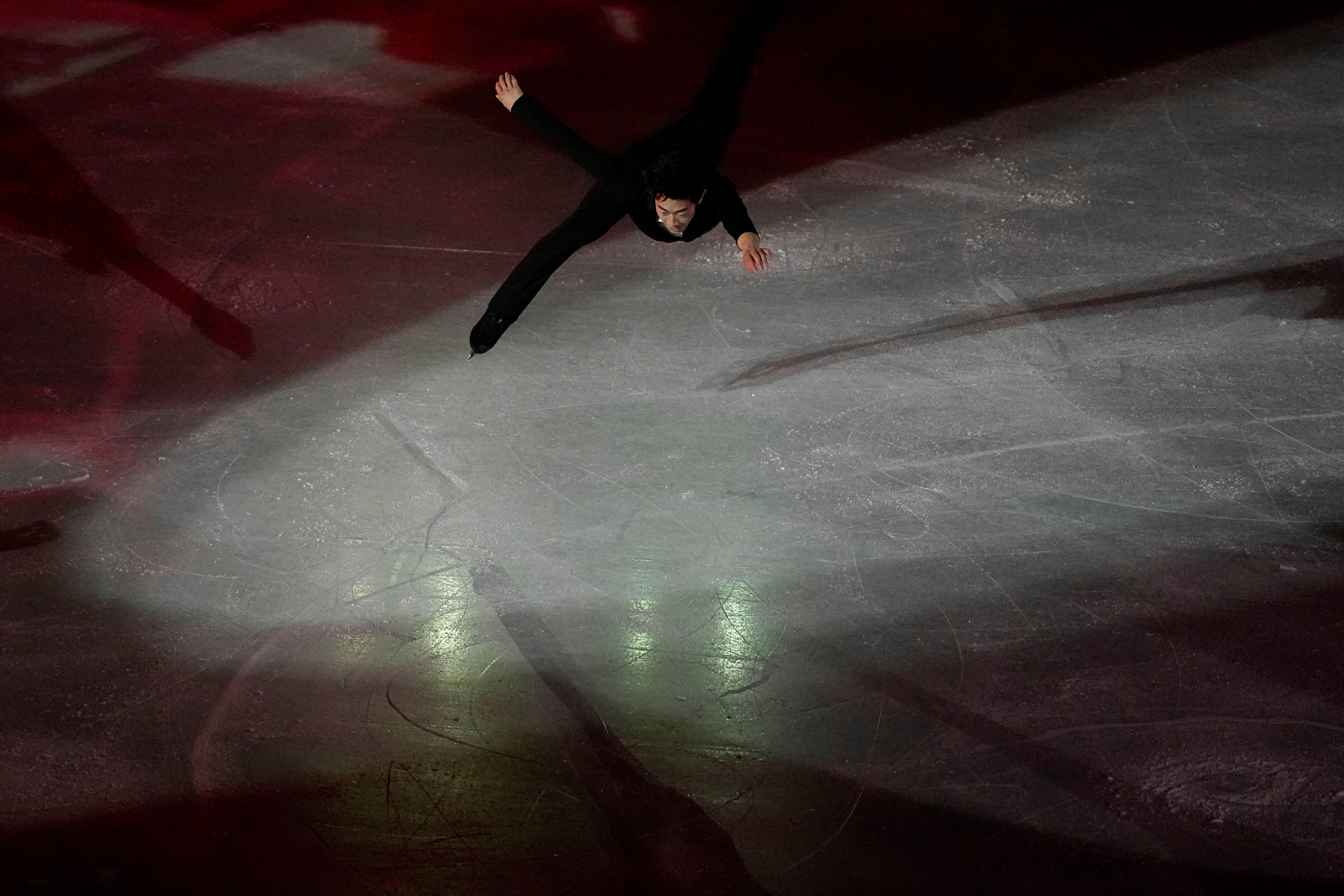 Nathan Chen, of the United States, performs during the figure skating gala at the 2022 Winter Olympics, Sunday, Feb. 20, 2022, in Beijing. (AP Photo/David J. Phillip)