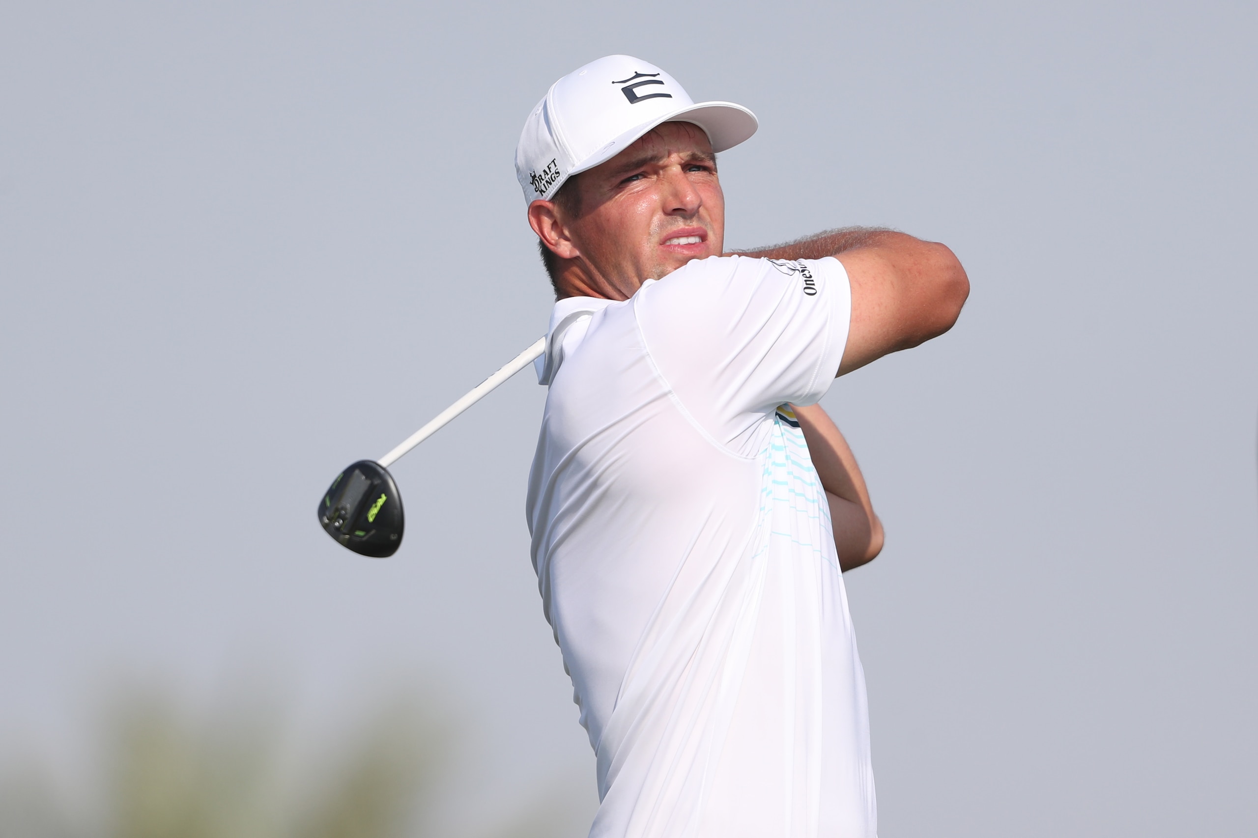 AL MUROOJ, SAUDI ARABIA - FEBRUARY 03:   Bryson DeChambeau of the United States tees off on the 14th hole during day one of the PIF Saudi International at Royal Greens Golf & Country Club on February 3, 2022 in Al Murooj, Saudi Arabia. (Photo by Oisin Keniry/Getty Images)
