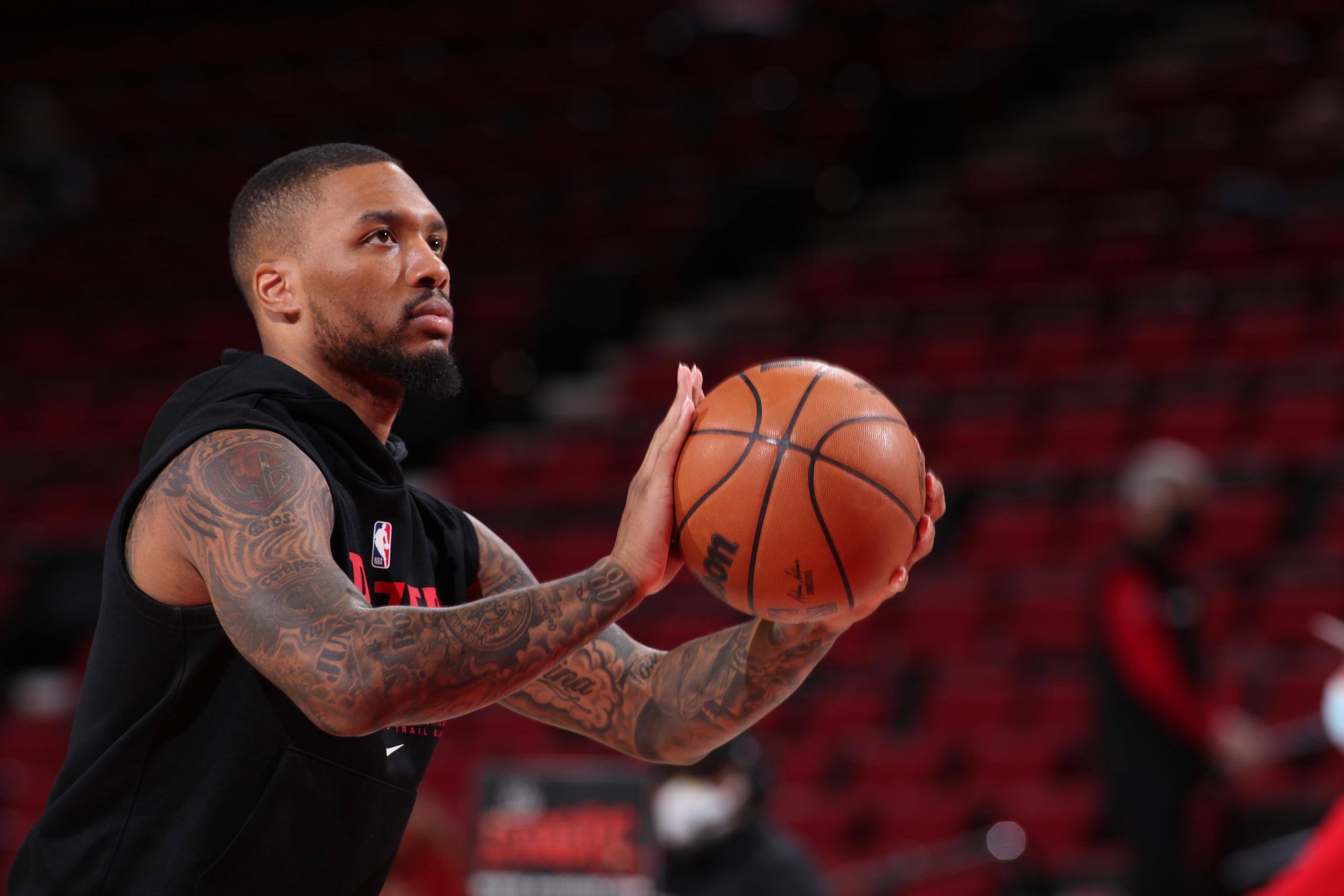 PORTLAND, OR - FEBRUARY 12: Damian Lillard #0 of the Portland Trail Blazers warms up before the game against the New York Knicks on February 12, 2022 at the Moda Center Arena in Portland, Oregon. NOTE TO USER: User expressly acknowledges and agrees that, by downloading and or using this photograph, user is consenting to the terms and conditions of the Getty Images License Agreement. Mandatory Copyright Notice: Copyright 2022 NBAE (Photo by Cameron Browne/NBAE via Getty Images)