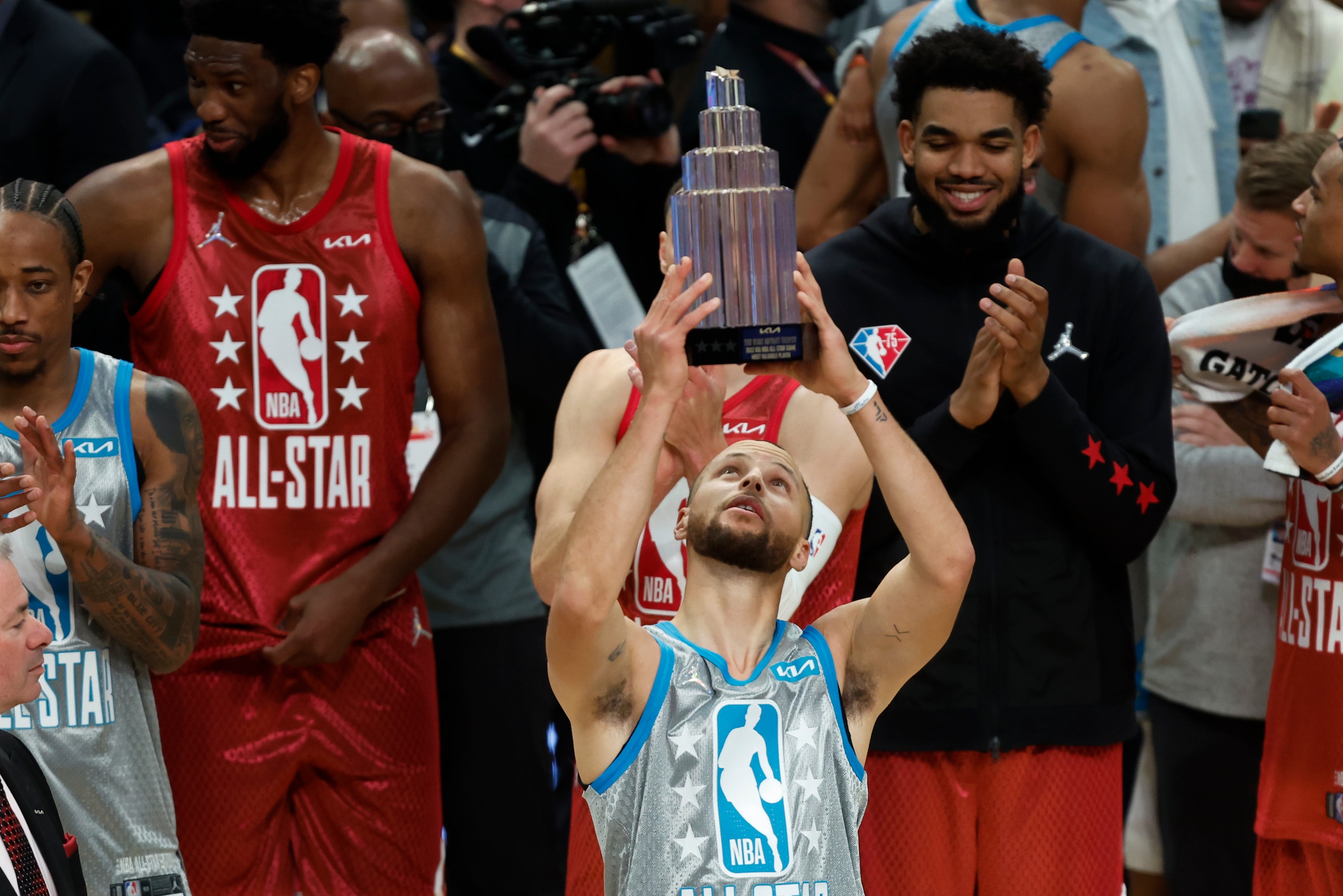 Golden State Warriors' Stephen Curry holds up the Kobe Bryant Trophy after being named the MVP of the NBA All-Star basketball game, Sunday, Feb. 20, 2022, in Cleveland. (AP Photo/Ron Schwane) Golden State Warriors' Stephen Curry holds up the Kobe Bryant Trophy after being named the MVP of the NBA All-Star basketball game, Sunday, Feb. 20, 2022, in Cleveland. (AP Photo/Ron Schwane)