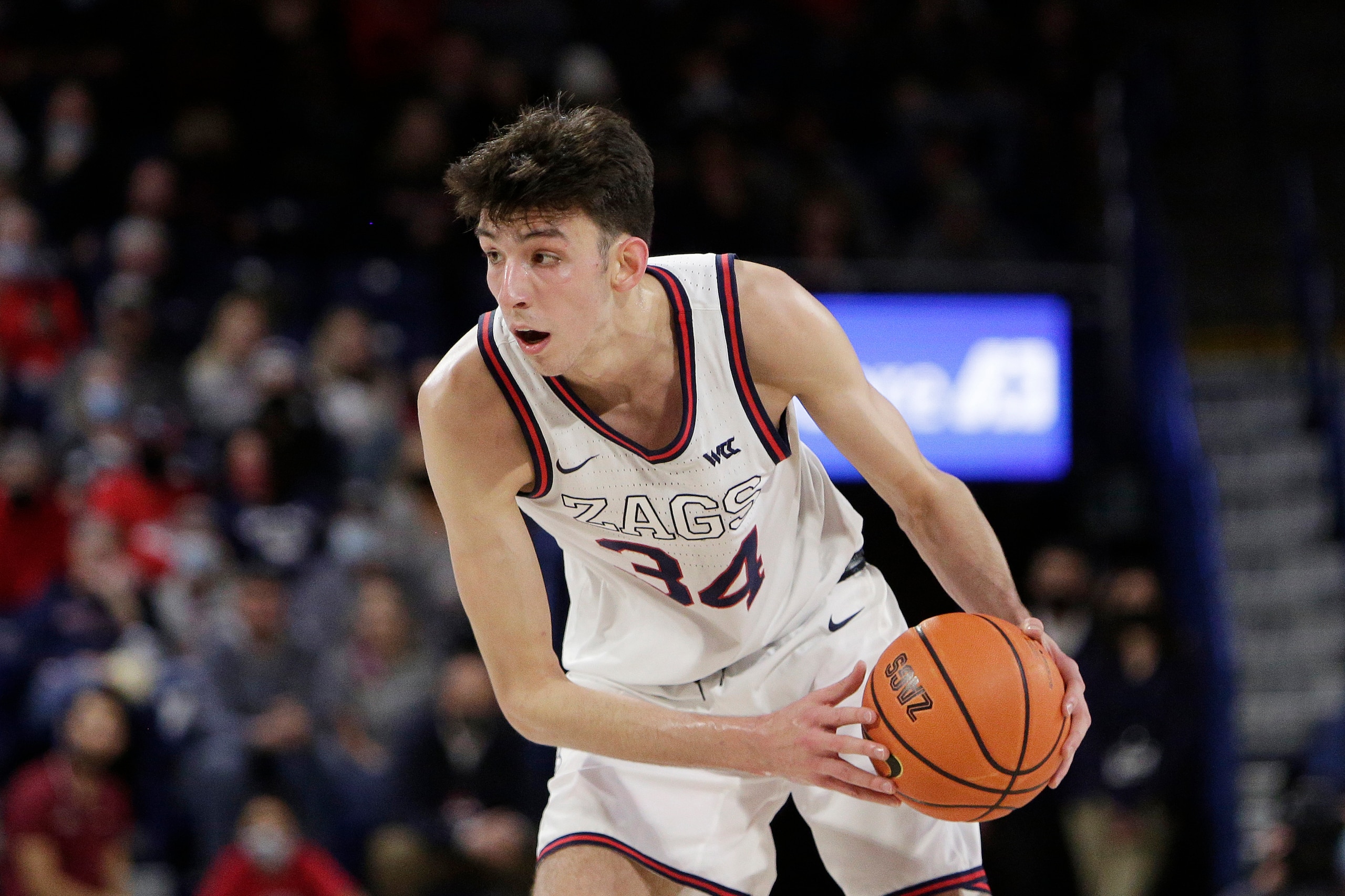 Gonzaga center Chet Holmgren controls the ball during the second half of an NCAA college basketball game against Santa Clara, Saturday, Feb. 19, 2022, in Spokane, Wash. (AP Photo/Young Kwak)