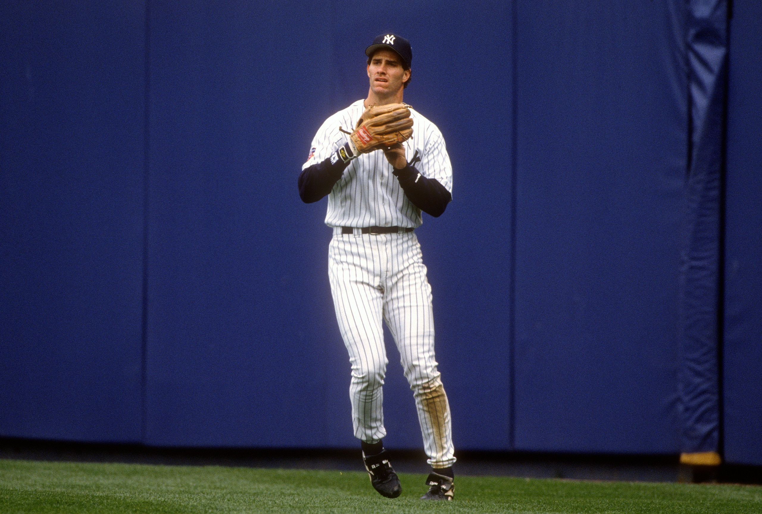 NEW YORK -  CIRCA 1997: Paul O'Neill #21 of the New York Yankees looks to throw the ball back into the infield during an Major League Baseball game circa 1997 at Yankee Stadium in the Bronx borough of New York City. O'Neill played for the Yankees from 1993-2001. (Photo by Focus on Sport/Getty Images)