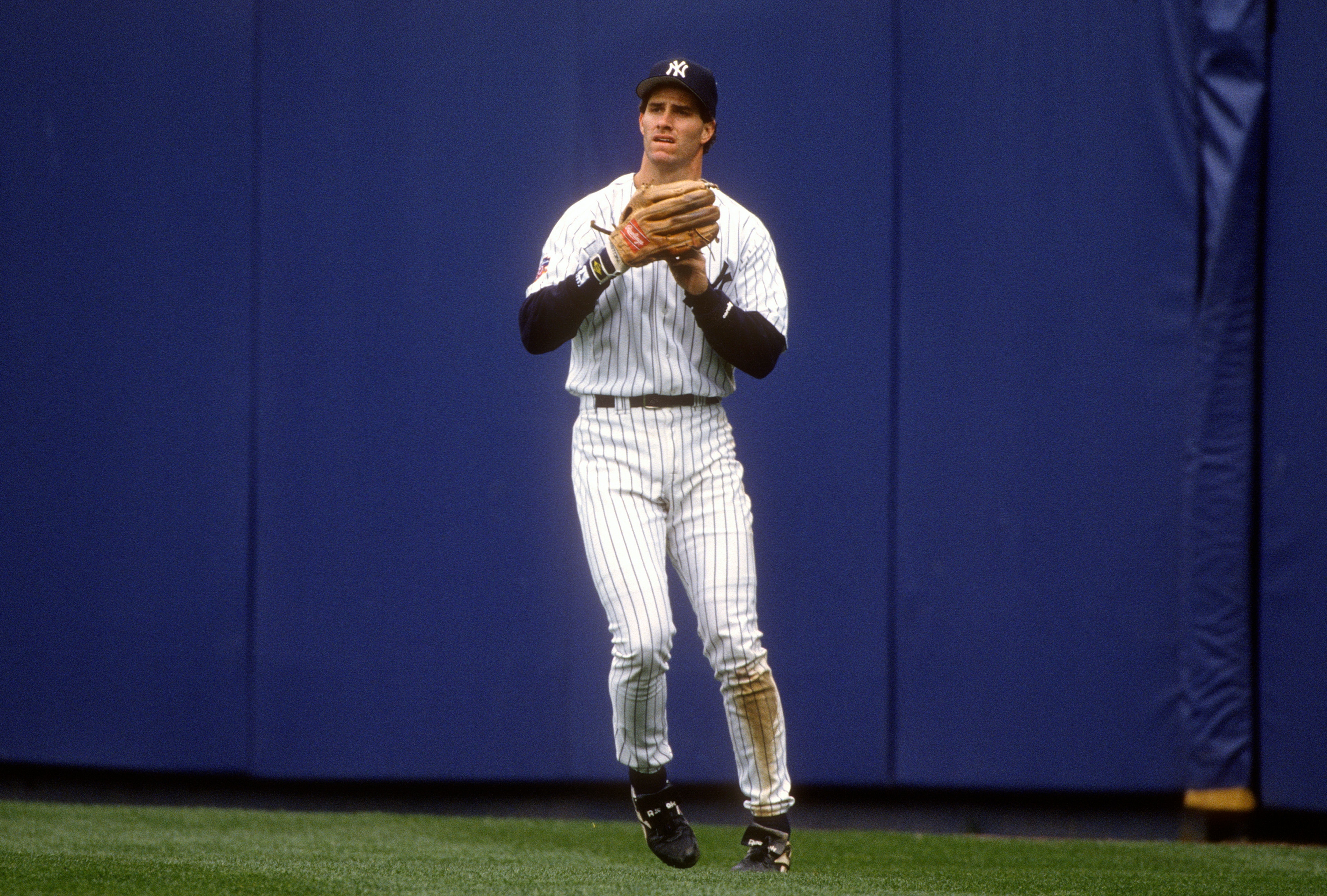 NEW YORK -  CIRCA 1997: Paul O'Neill #21 of the New York Yankees looks to throw the ball back into the infield during an Major League Baseball game circa 1997 at Yankee Stadium in the Bronx borough of New York City. O'Neill played for the Yankees from 1993-2001. (Photo by Focus on Sport/Getty Images)