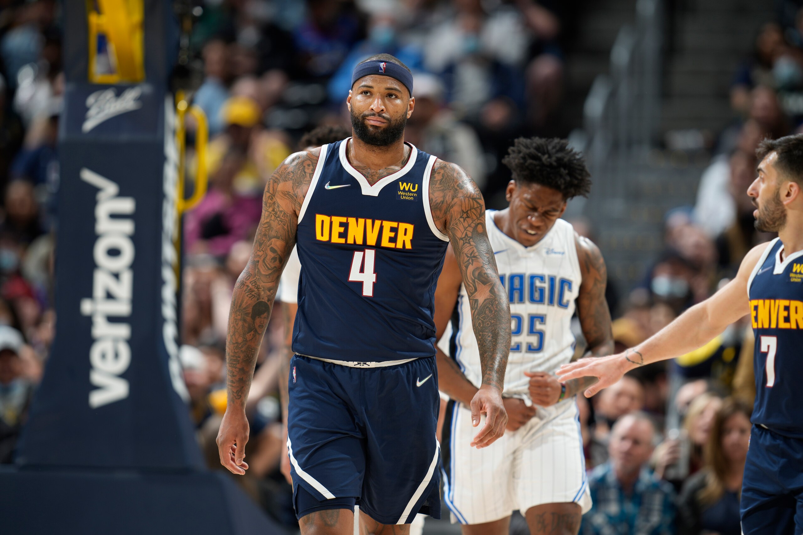 Denver Nuggets center DeMarcus Cousins (4) in the second half of an NBA basketball game Monday, Feb. 14, 2022, in Denver. The Nuggets won 121-111. (AP Photo/David Zalubowski)