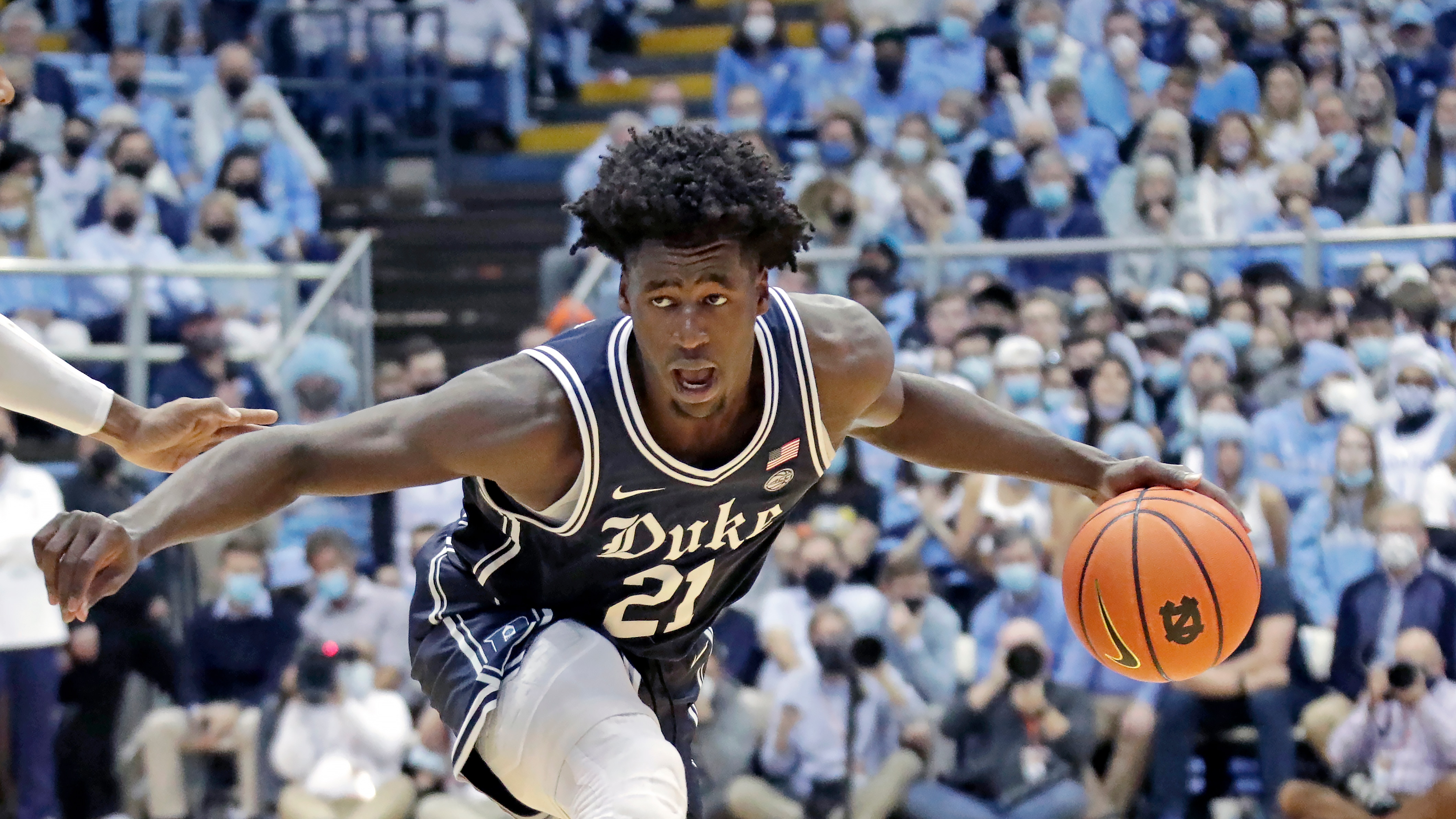 Duke forward A.J. Griffin (21) drives against North Carolina during an NCAA college basketball game Saturday, Feb. 5, 2022, in Chapel Hill, N.C. (AP Photo/Chris Seward)