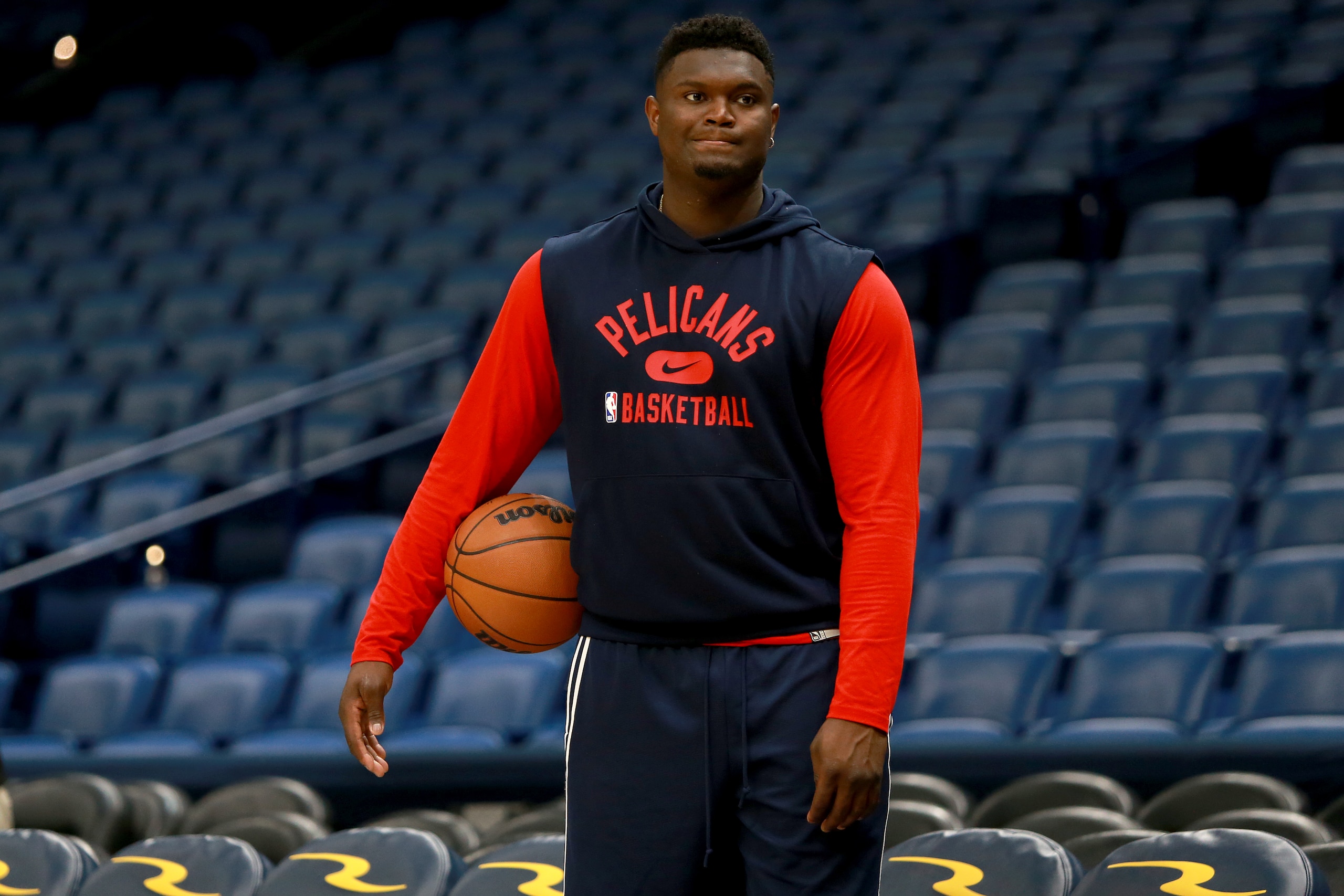 NEW ORLEANS, LOUISIANA - NOVEMBER 13: Zion Williamson #1 of the New Orleans Pelicans stands on the court prior to the start of a NBA game against the Memphis Grizzlies at Smoothie King Center on November 13, 2021 in New Orleans, Louisiana. NOTE TO USER: User expressly acknowledges and agrees that, by downloading and or using this photograph, User is consenting to the terms and conditions of the Getty Images License Agreement. (Photo by Sean Gardner/Getty Images) NEW ORLEANS, LOUISIANA - NOVEMBER 13: Zion Williamson #1 of the New Orleans Pelicans stands on the court prior to the start of a NBA game against the Memphis Grizzlies at Smoothie King Center on November 13, 2021 in New Orleans, Louisiana. NOTE TO USER: User expressly acknowledges and agrees that, by downloading and or using this photograph, User is consenting to the terms and conditions of the Getty Images License Agreement. (Photo by Sean Gardner/Getty Images)