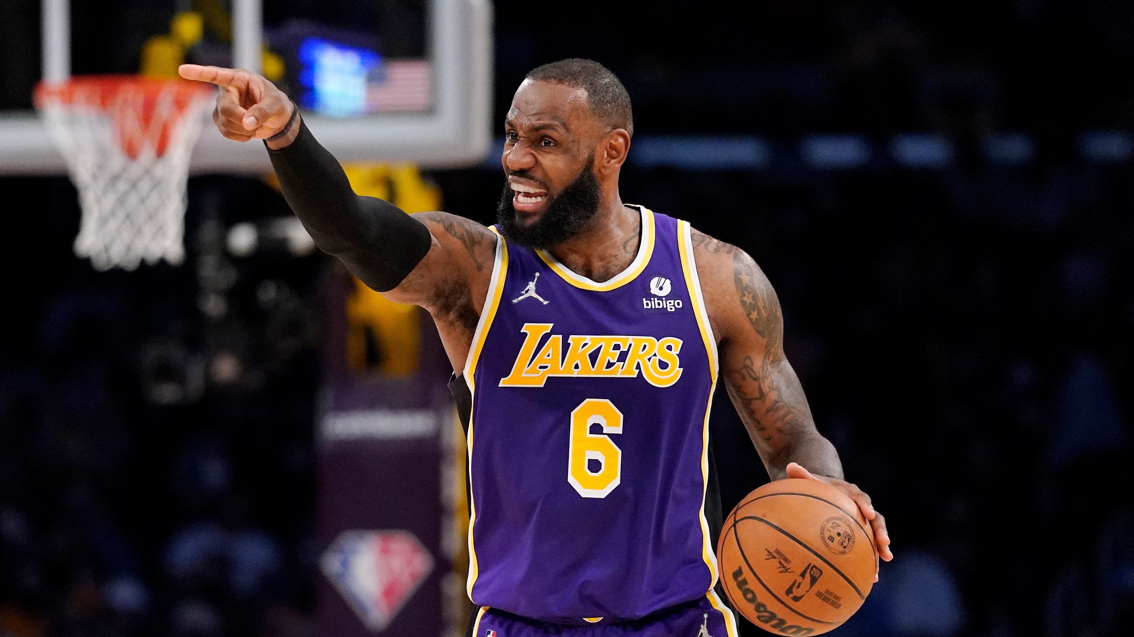 Los Angeles Lakers forward LeBron James gestures during the second half of an NBA basketball game against the Utah Jazz Wednesday, Feb. 16, 2022, in Los Angeles. The Lakers won 106-101. (AP Photo/Mark J. Terrill)