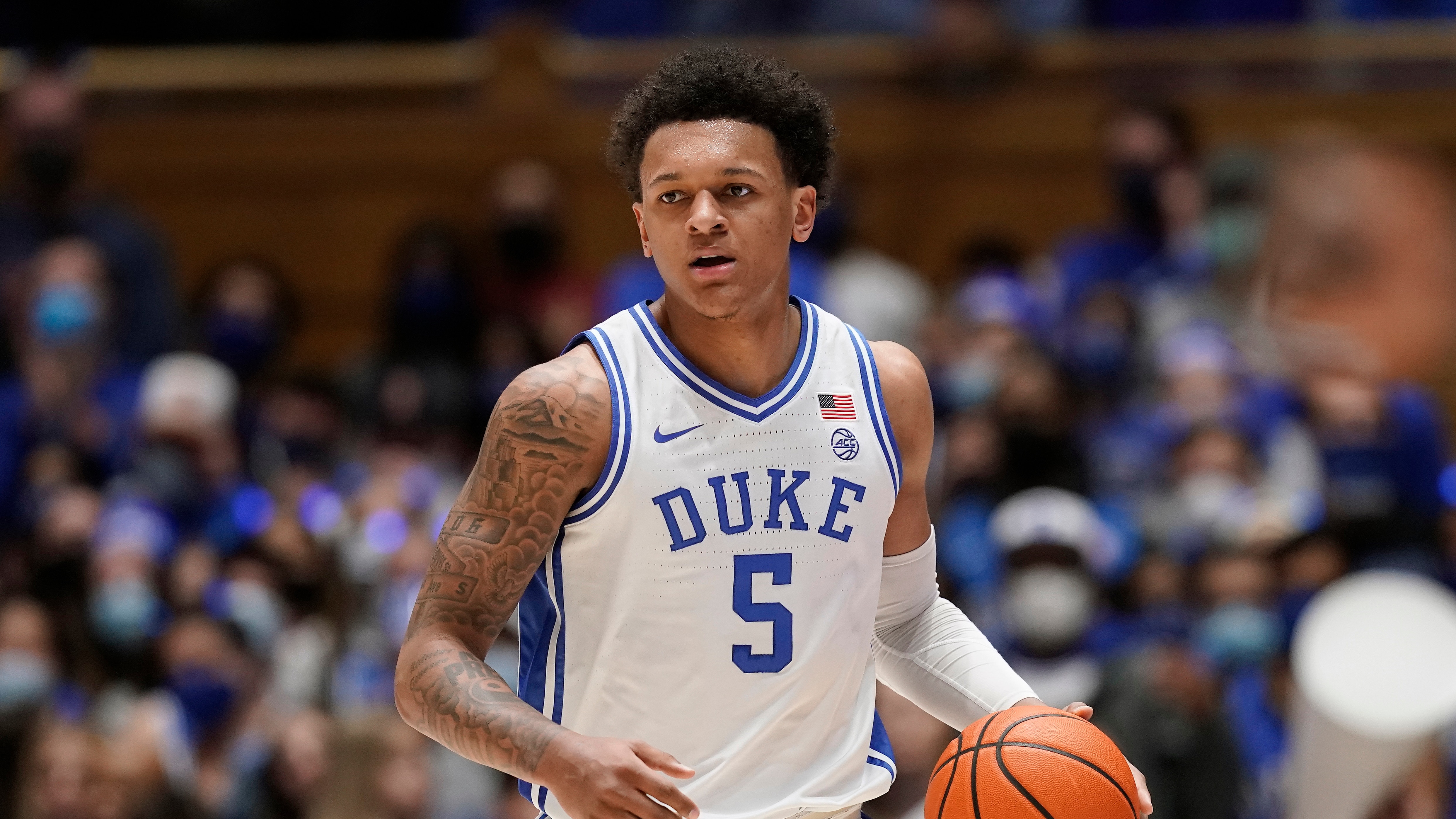 Duke forward Paolo Banchero (5) dribbles during the second half of an NCAA college basketball game against Florida State in Durham, N.C., Saturday, Feb. 19, 2022. (AP Photo/Gerry Broome)