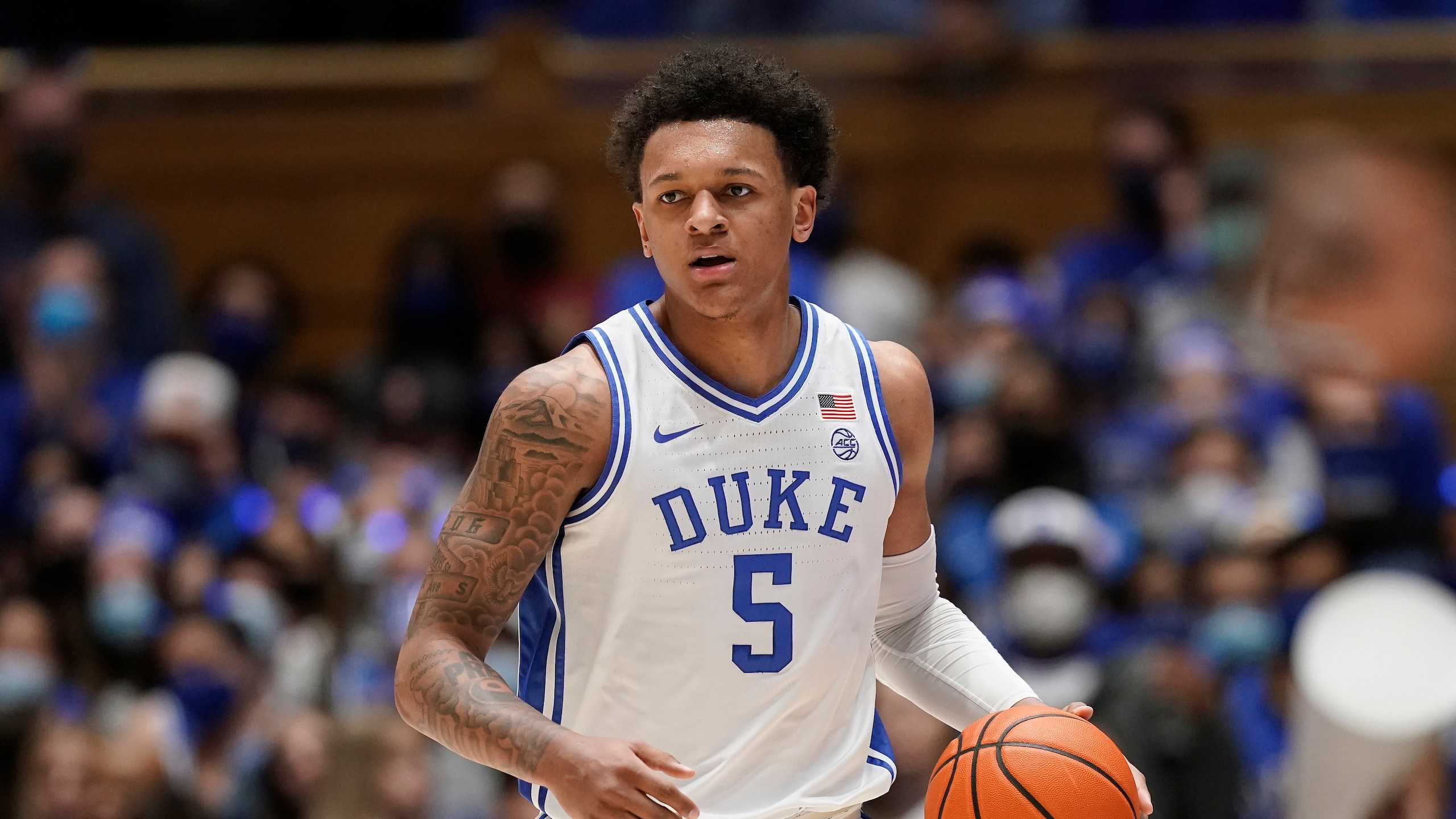 Duke forward Paolo Banchero (5) dribbles during the second half of an NCAA college basketball game against Florida State in Durham, N.C., Saturday, Feb. 19, 2022. (AP Photo/Gerry Broome)