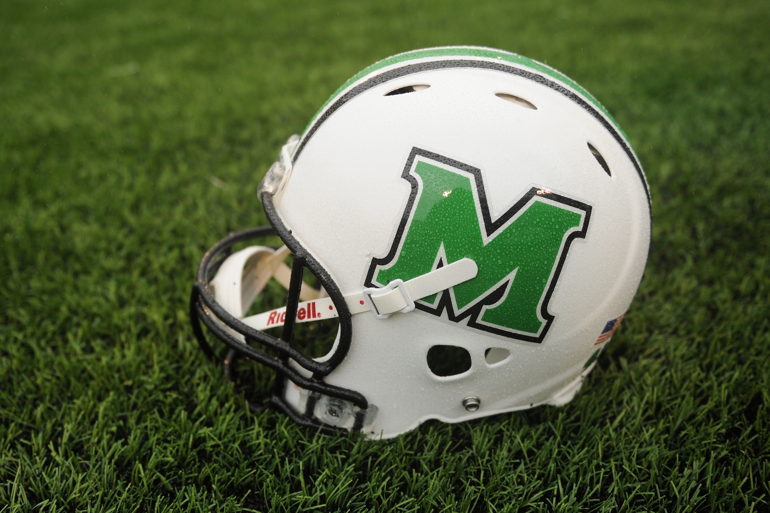 HUNTINGTON, WV - DECEMBER 06: A Marshall Thundering Herd helmet as seen on the sideleine at Joan C. Edwards Stadium during the Conference USA championship game on December 6, 2014 in Huntington, West Virginia. The Thundering Herd defeat the Bulldogs 26-23. (Photo by Maddie Meyer/Getty Images)