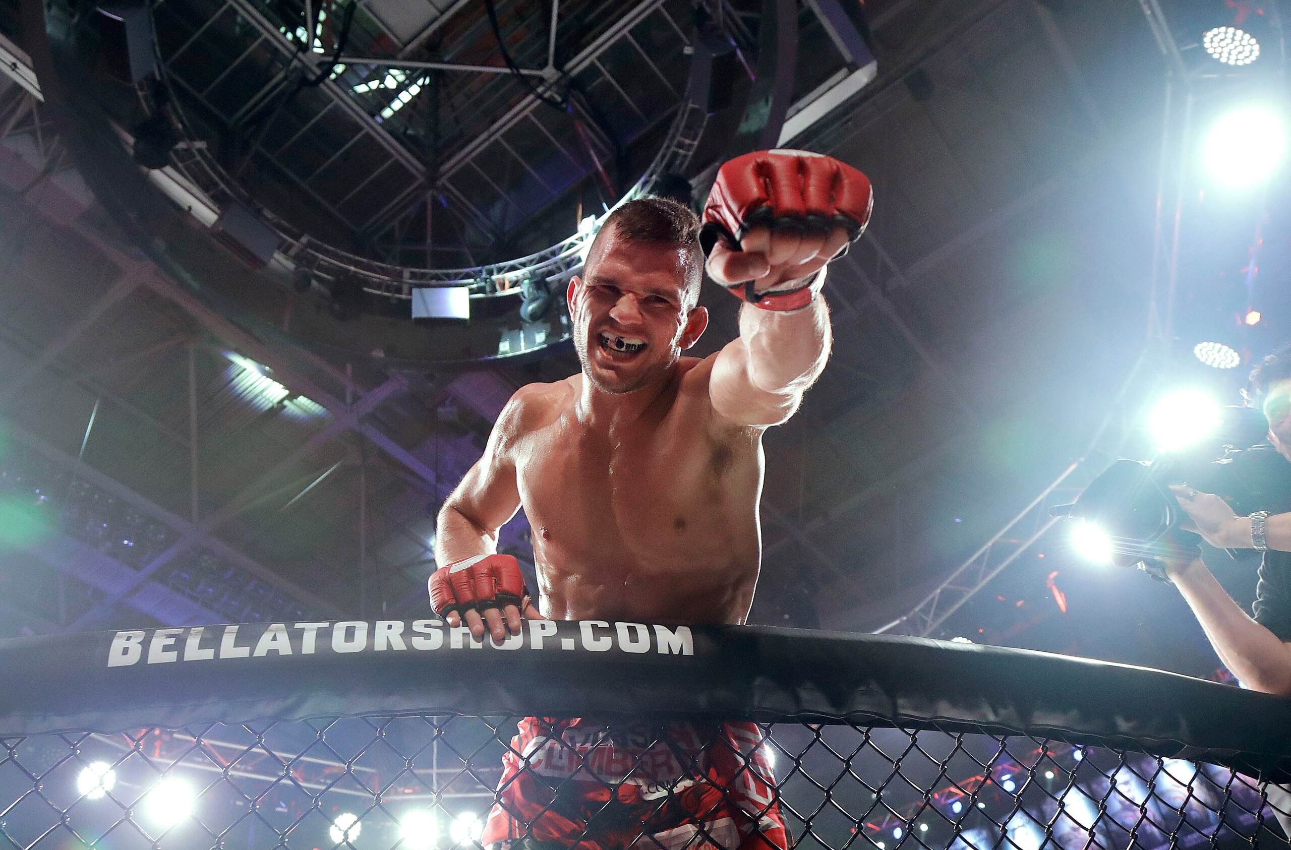 Adam Piccolotti celebrates after defeating Carrington Banks in a lightweight mixed martial arts fight at Bellator 199 in San Jose, Calif., Saturday, May 12, 2018. (AP Photo/Jeff Chiu)