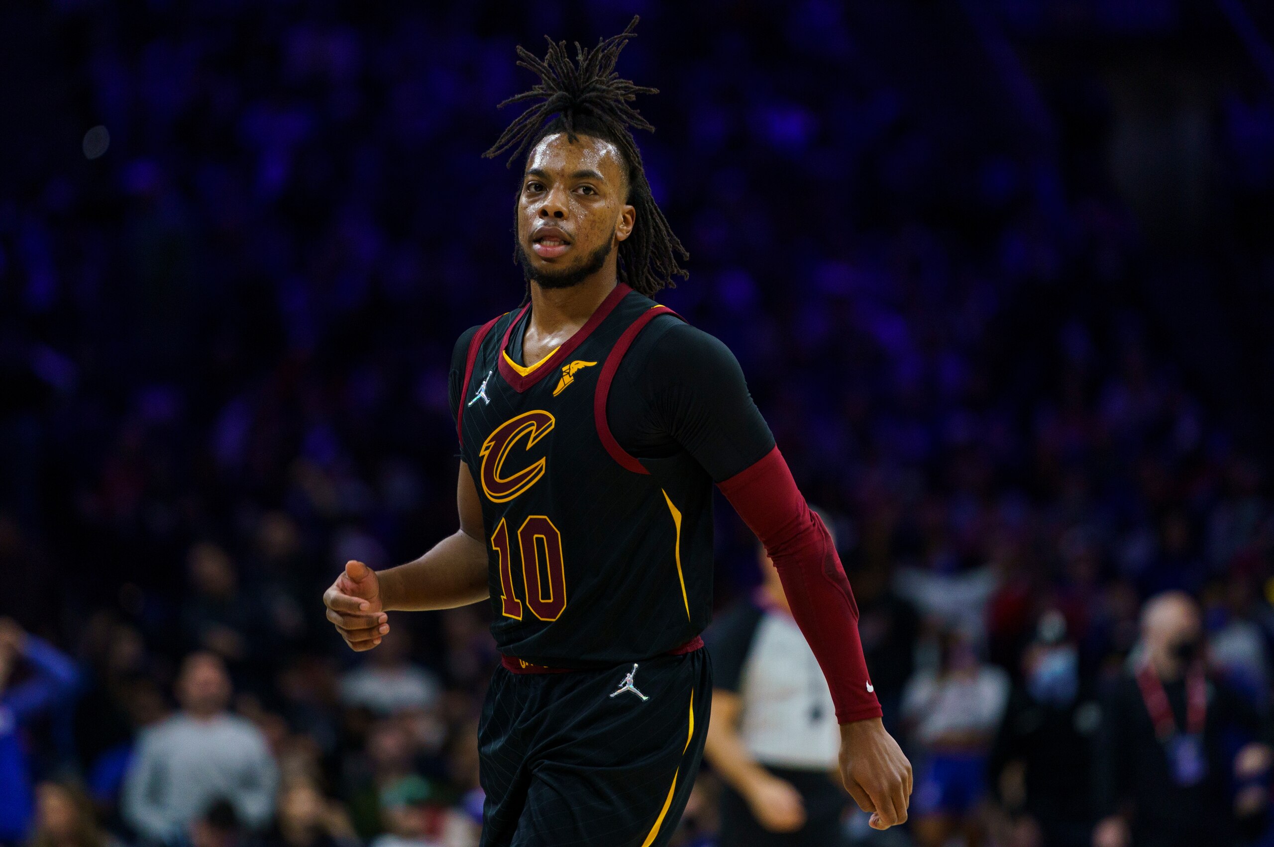Cleveland Cavaliers' Darius Garland looks on during the first half of an NBA basketball game against the Philadelphia 76ers, Saturday, Feb. 12, 2022, in Philadelphia. The 76ers won 103-93. (AP Photo/Chris Szagola)