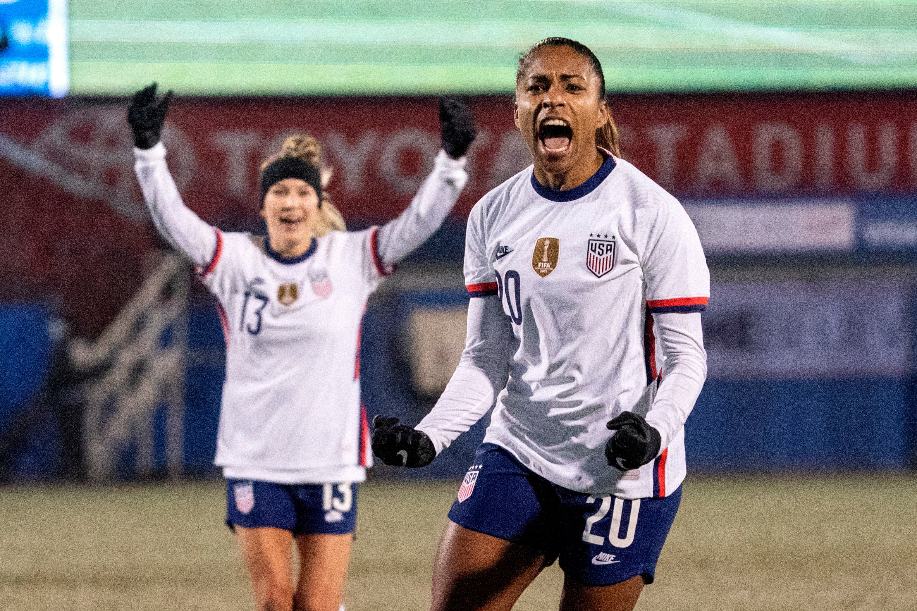 U.S. forward Catarina Macario (20) and midfielder Ashley Sanchez (13) celebrate Macario's goal during the first half against Iceland in a She Believes Cup soccer match Wednesday, Feb. 23, 2022 in Frisco, Texas. (AP Photo/Jeffrey McWhorter)