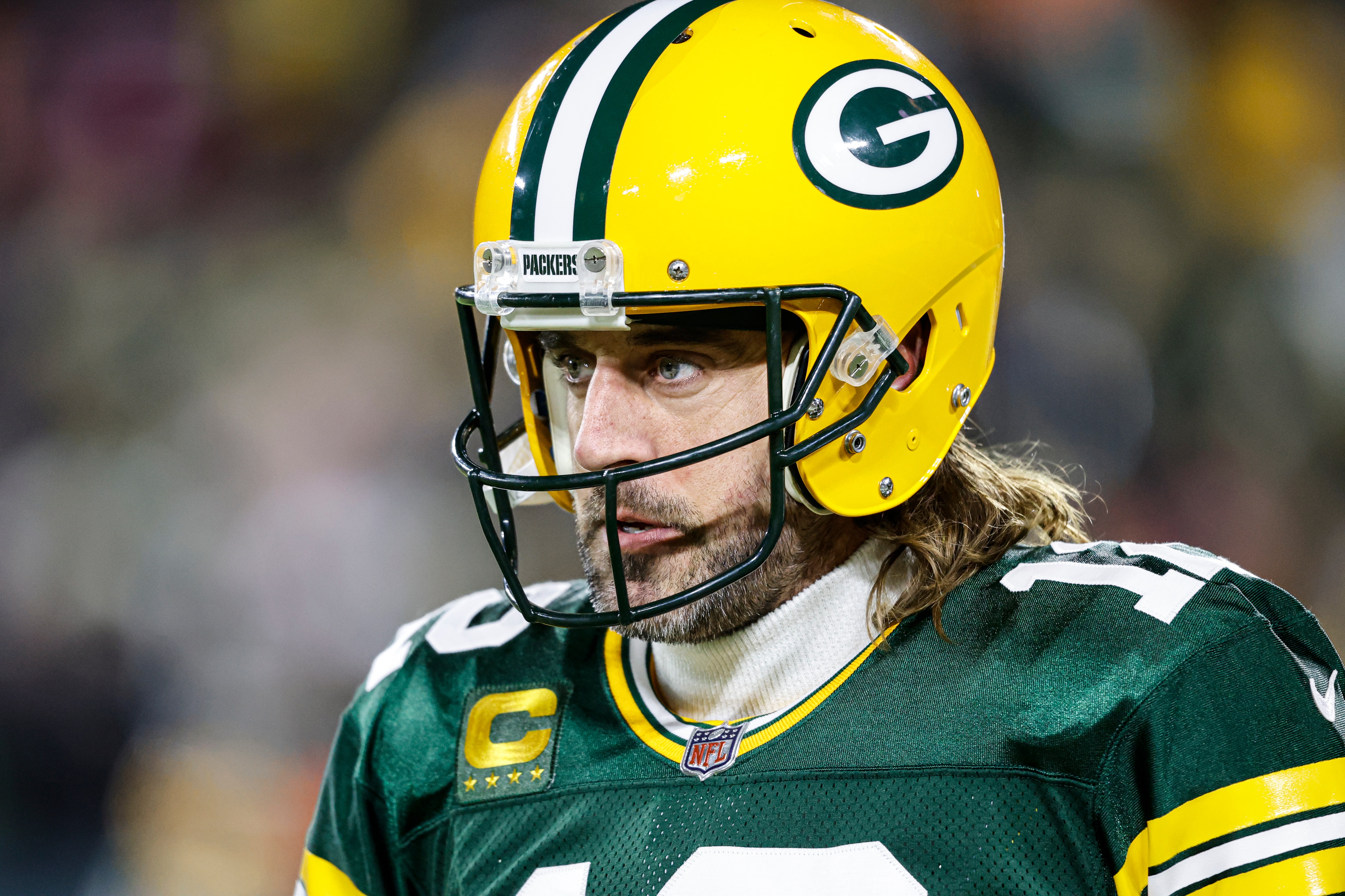 Green Bay Packers quarterback Aaron Rodgers (12) warms up before an NFL divisional playoff football game against the San Francisco 49ers, Saturday, Jan 22. 2022, in Green Bay, Wis. (AP Photo/Jeffrey Phelps)