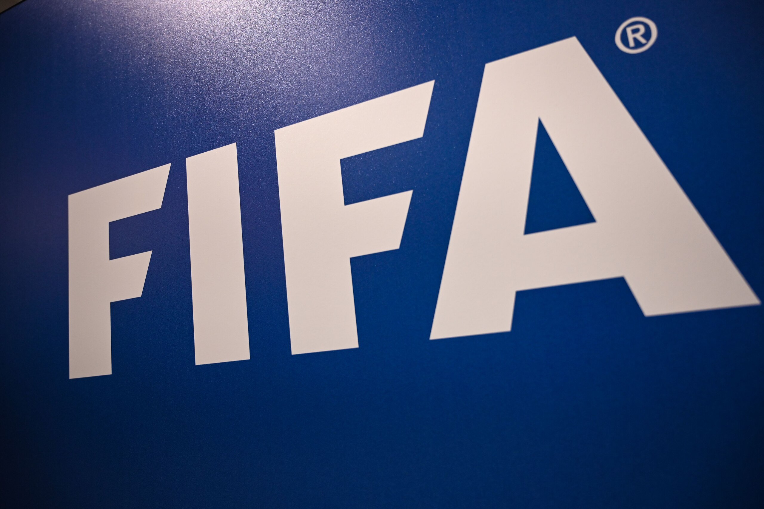 A picture shows the FIFA logo during a press conference held by the president of the football's governing body at the FIFA Executive Football Summit on February 15, 2019 in Istanbul. (Photo by OZAN KOSE / AFP)        (Photo credit should read OZAN KOSE/AFP via Getty Images)