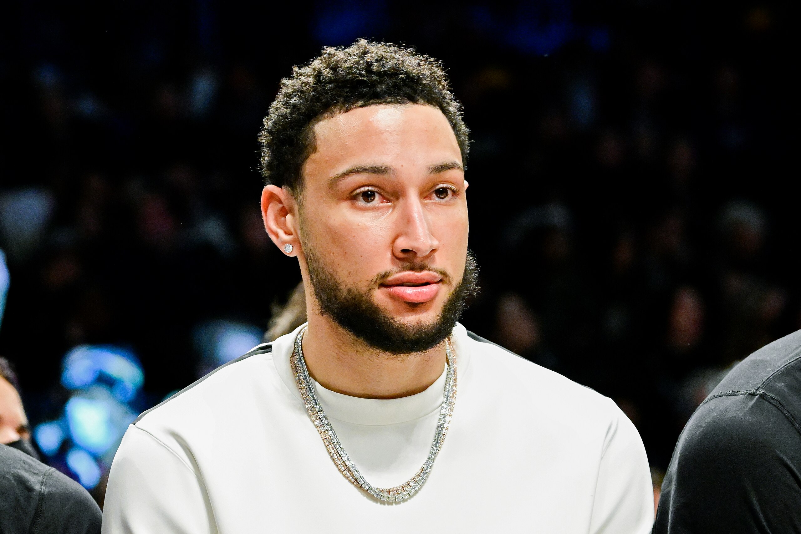 NEW YORK, NEW YORK - FEBRUARY 14:  Ben Simmons of the Brooklyn Nets looks on from the bench against the Sacramento Kings at Barclays Center on February 14, 2022 in New York City. NOTE TO USER: User expressly acknowledges and agrees that, by downloading and or using this photograph, User is consenting to the terms and conditions of the Getty Images License Agreement.  (Photo by Steven Ryan/Getty Images)