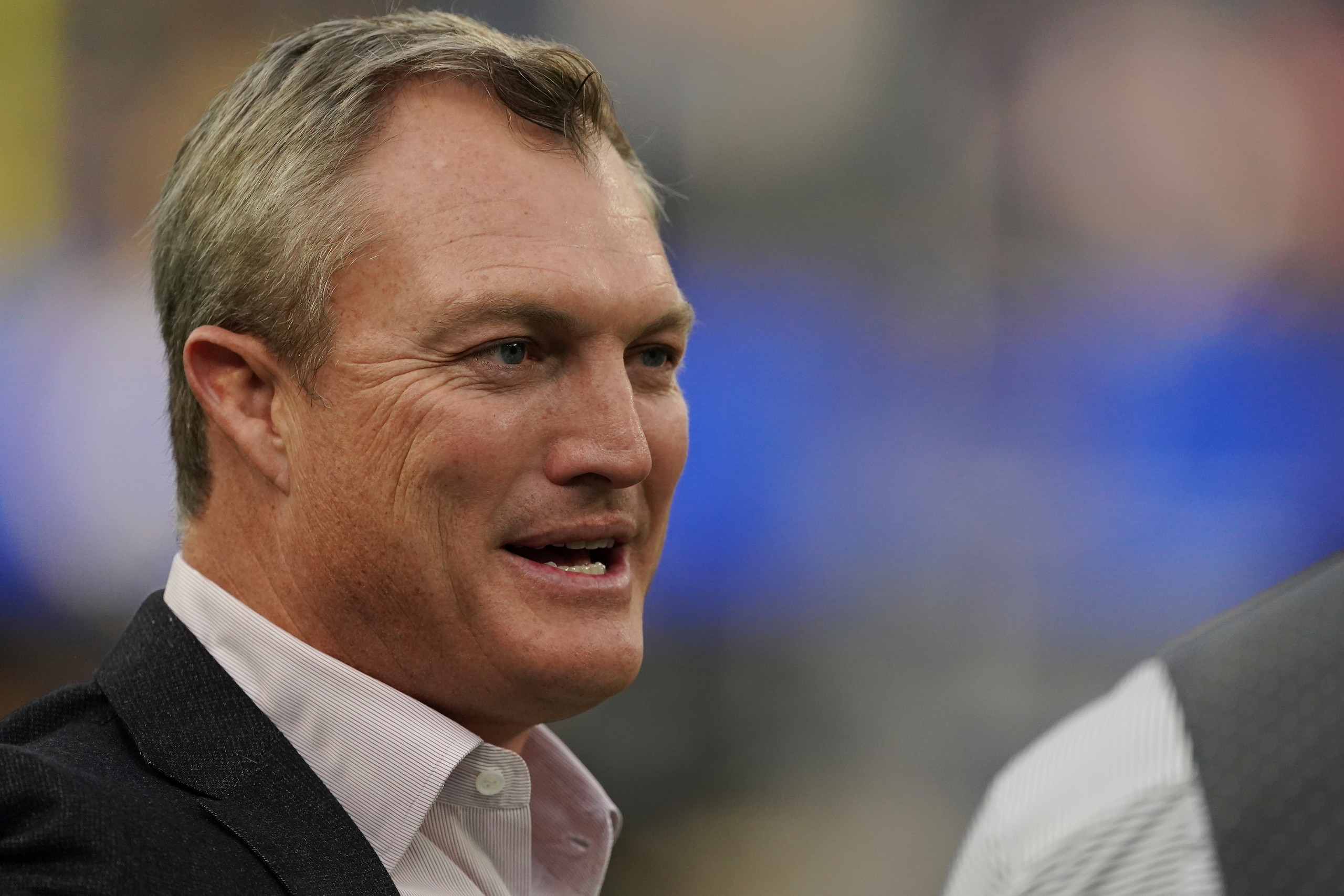 San Francisco 49ers general manager John Lynch walks the sideline prior to taking on the Los Angeles Rams in the NFL NFC Championship game, Sunday, Jan. 30, 2022 in Inglewood, Calif. The Rams defeated the 49ers 20-17. (AP Photo/Doug Benc)