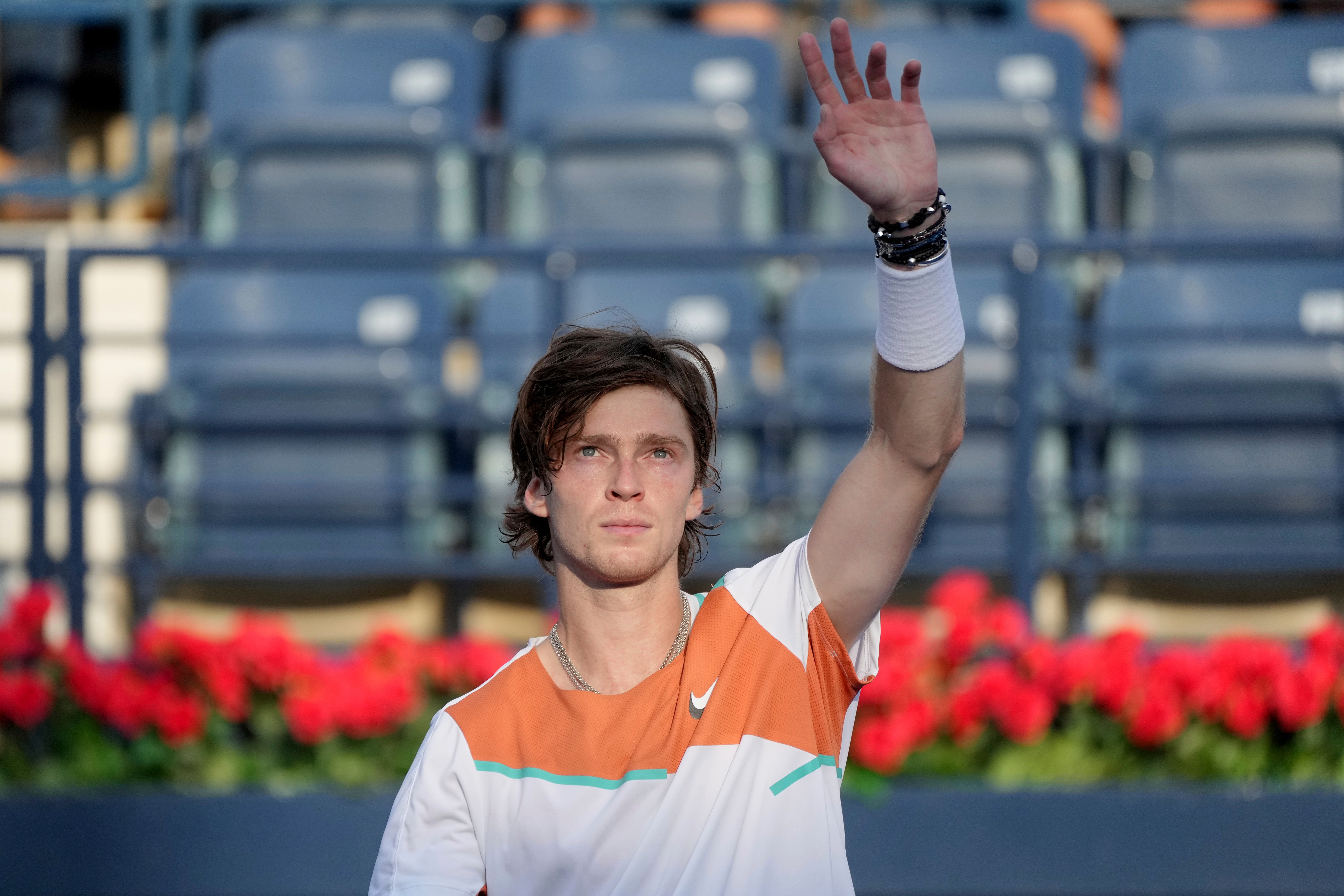 Russia's Andrey Rublev celebrates after he beats Mackenzie McDonald of the U.S. during a quarterfinal match of the Dubai Duty Free Tennis Championship in Dubai, United Arab Emirates, Thursday, Feb. 24, 2022. (AP Photo/Ebrahim Noroozi)