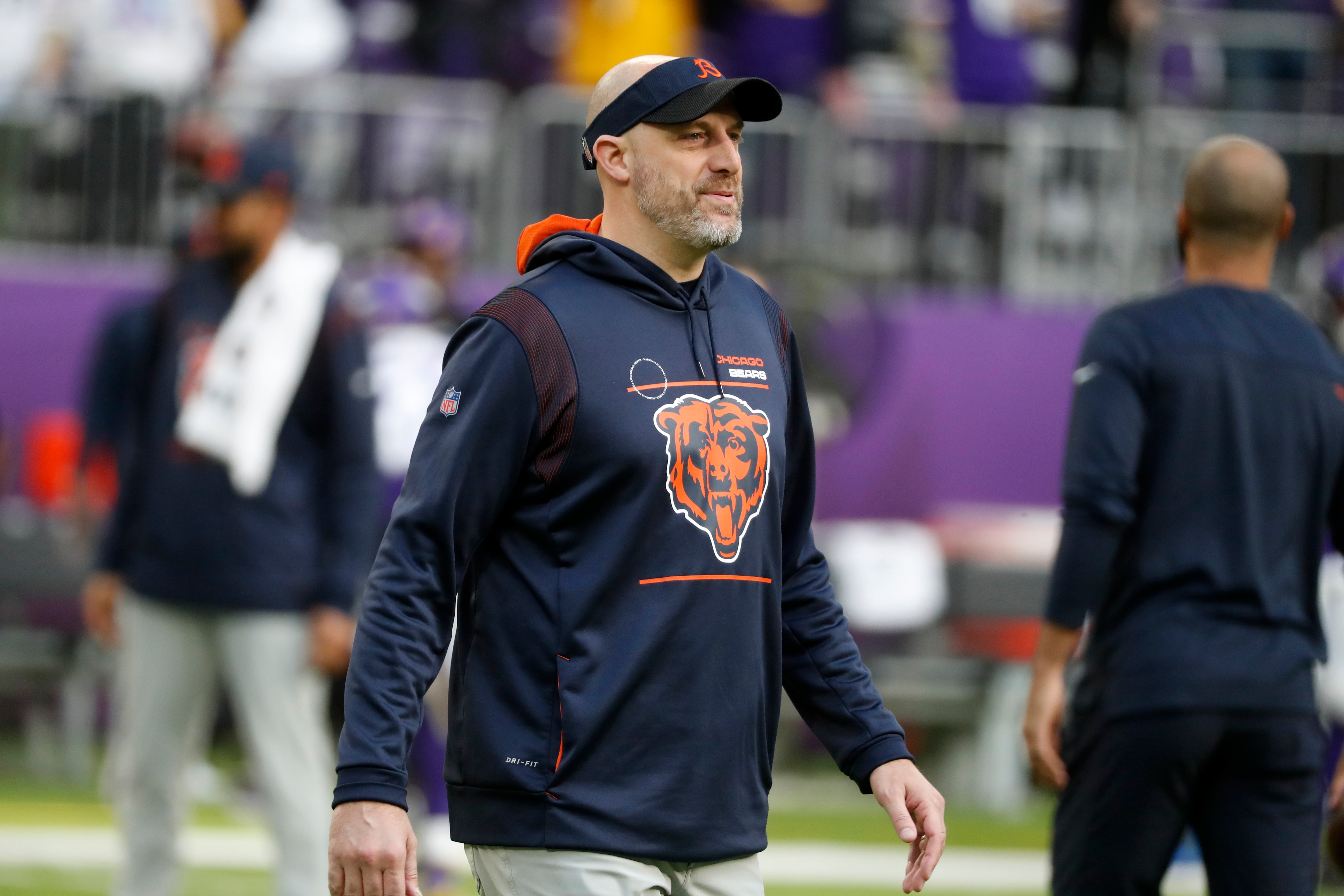 Chicago Bears head coach Matt Nagy walks on the field before an NFL football game against the Minnesota Vikings, Sunday, Jan. 9, 2022, in Minneapolis. (AP Photo/Bruce Kluckhohn)