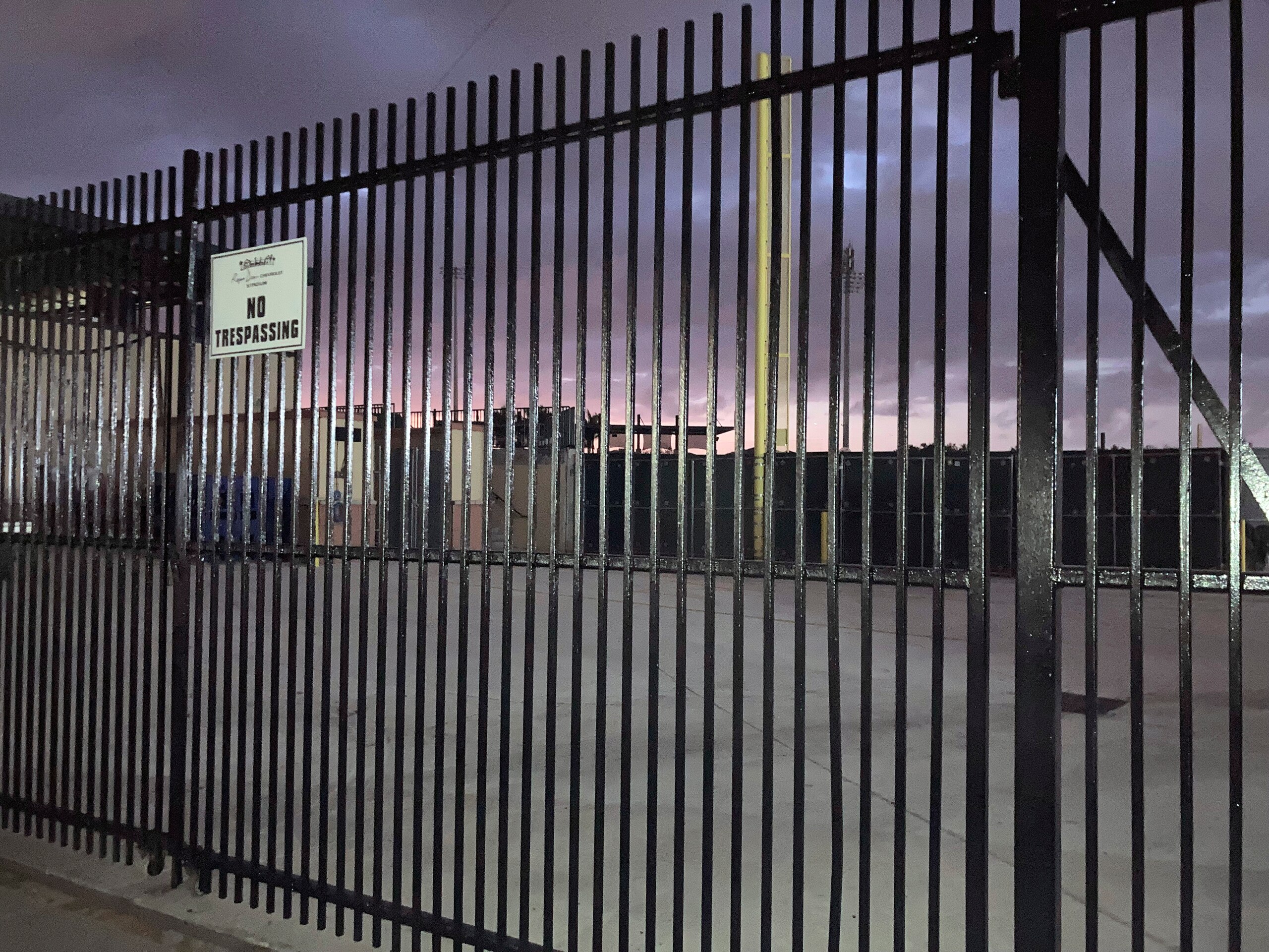 Dusk falls over Roger Dean Stadium in Jupiter, Fla., just after MLB labor talks recessed for the night, Monday, Feb. 21, 2022. Baseball labor negotiations moved to the spring training ballpark from New York as players and owners join the talks, which enter a more intensive phase with perhaps a week left to salvage opening day on March 31. (AP Photo/Ron Blum) Dusk falls over Roger Dean Stadium in Jupiter, Fla., just after MLB labor talks recessed for the night, Monday, Feb. 21, 2022. Baseball labor negotiations moved to the spring training ballpark from New York as players and owners join the talks, which enter a more intensive phase with perhaps a week left to salvage opening day on March 31. (AP Photo/Ron Blum)